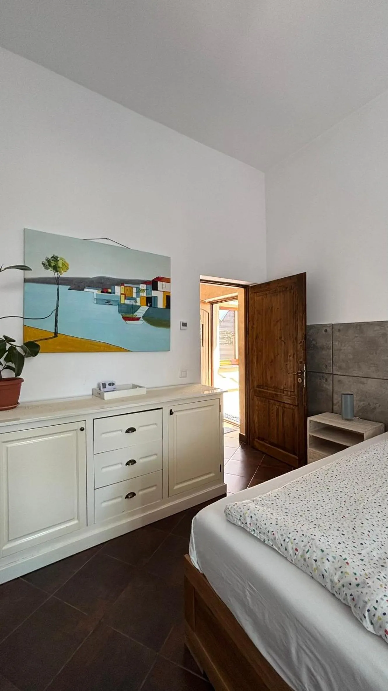 Bed in Pannónia Rooms and Apartments