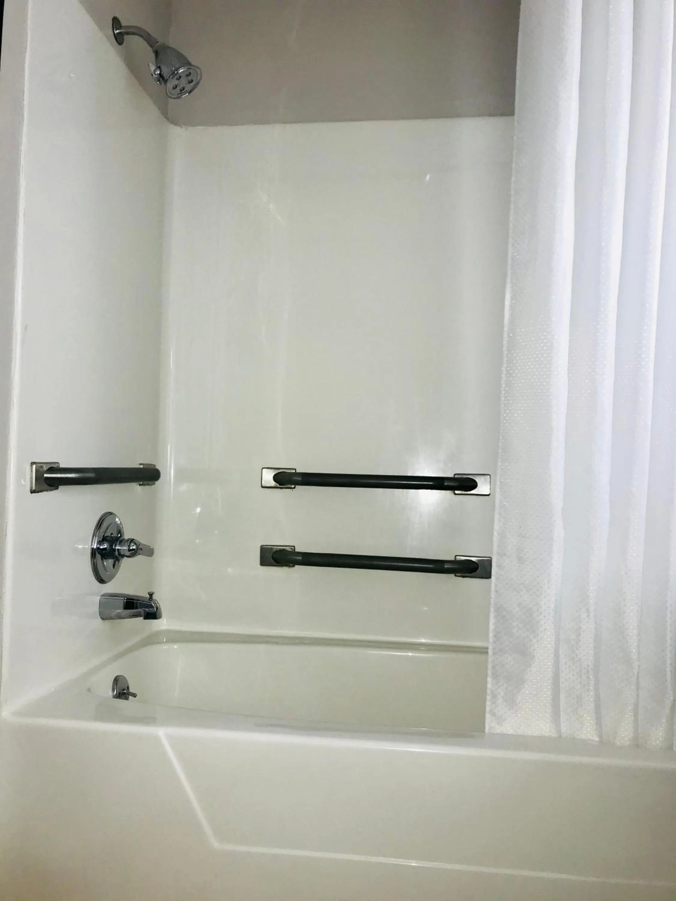 Shower in Country Inn & Suites by Radisson, Warner Robins, GA