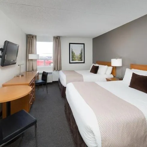 Bed in Heritage Inn Hotel & Convention Centre - Pincher Creek