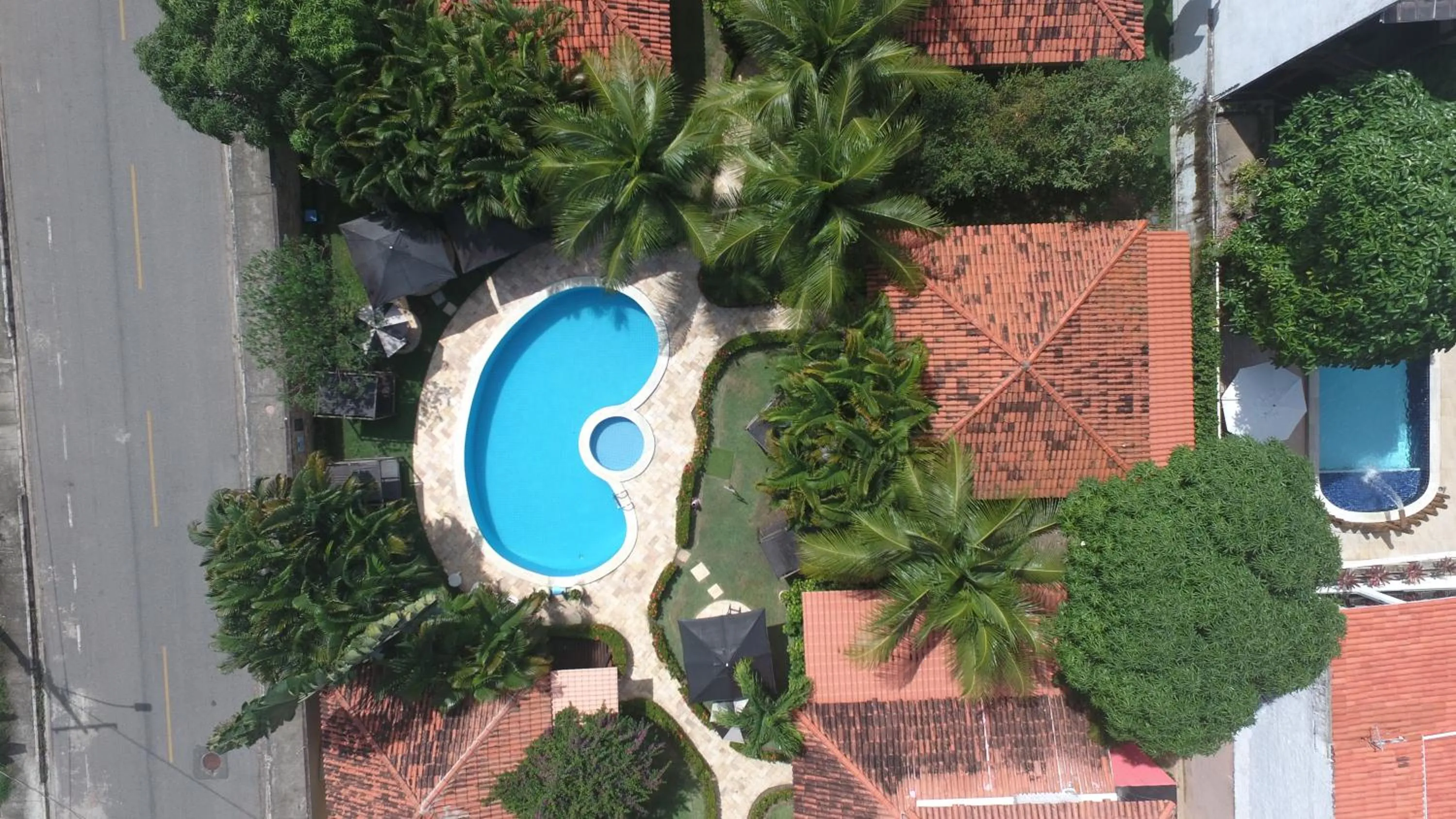 Swimming pool in La Dolce Vita Flat & Pousada