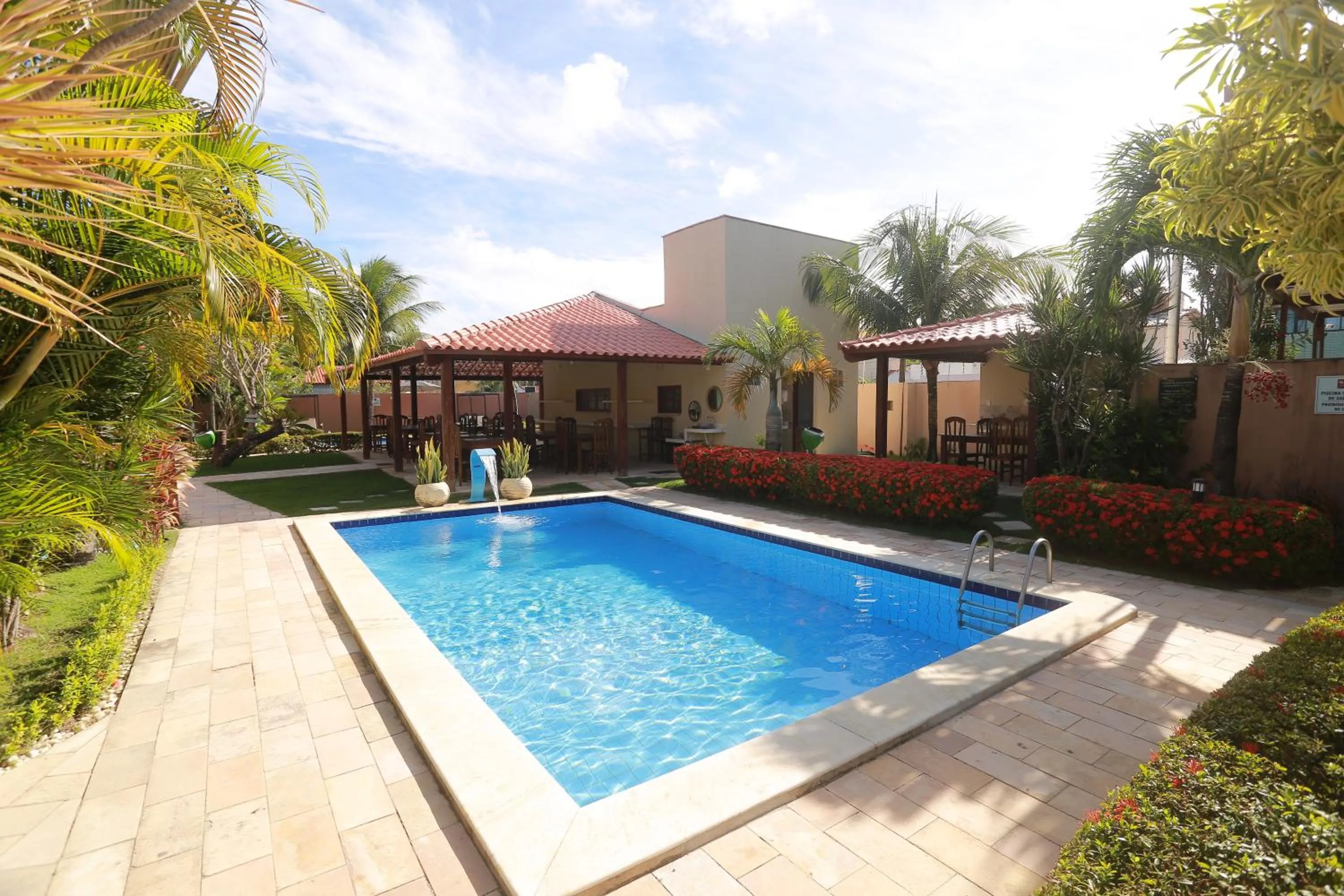 Swimming pool in La Dolce Vita Flat & Pousada