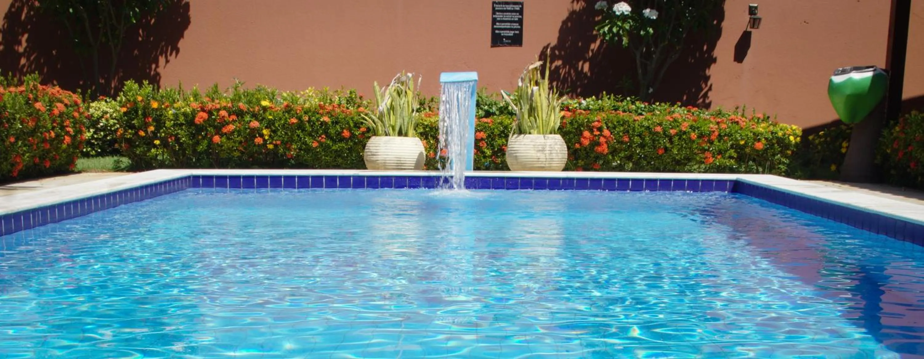 Swimming pool in La Dolce Vita Flat & Pousada