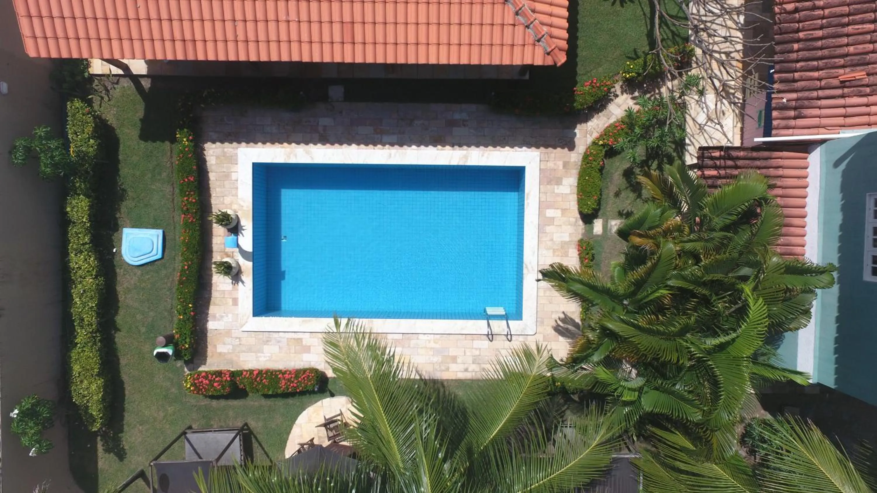 Swimming pool in La Dolce Vita Flat & Pousada