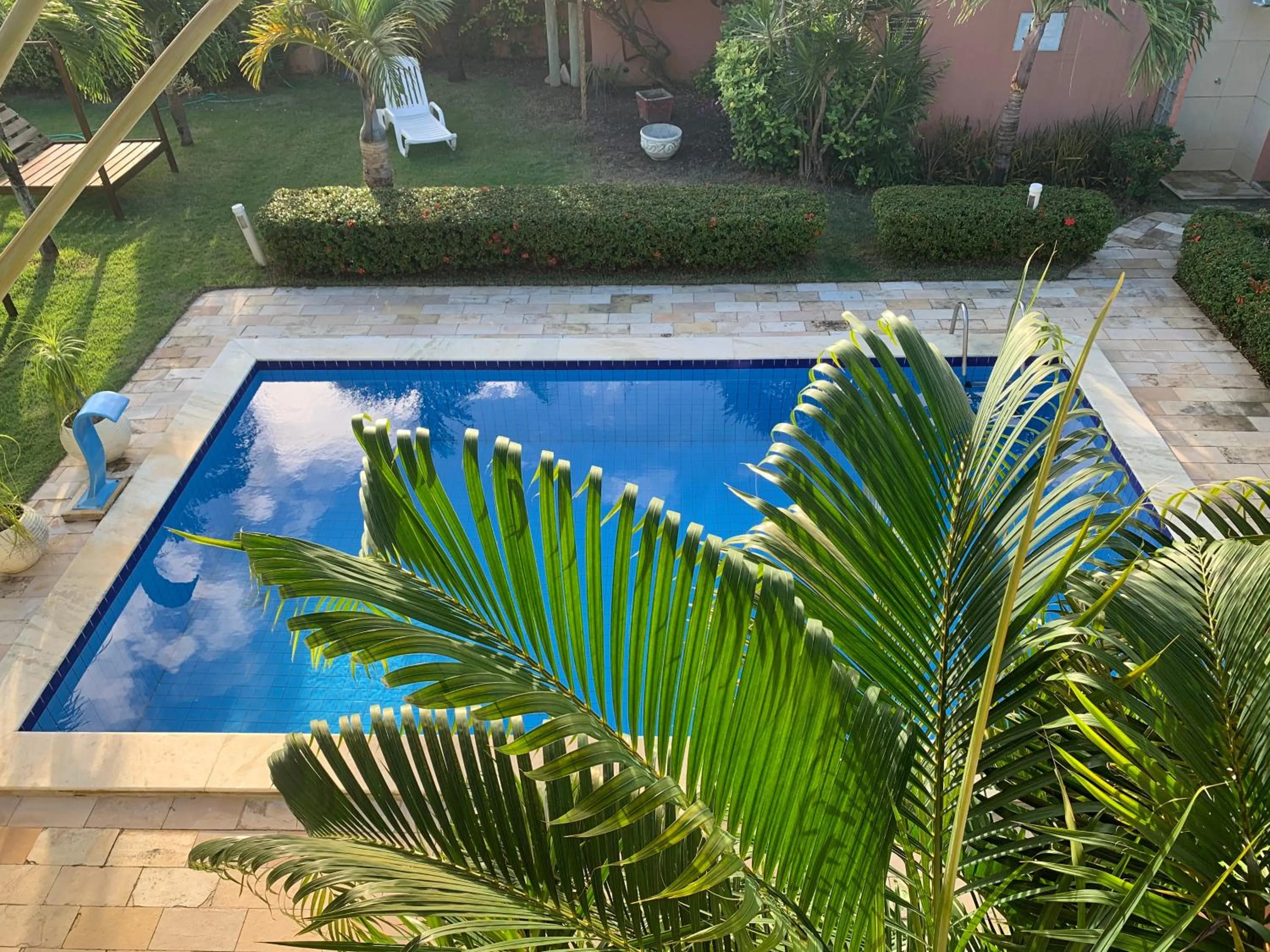 Swimming pool in La Dolce Vita Flat & Pousada