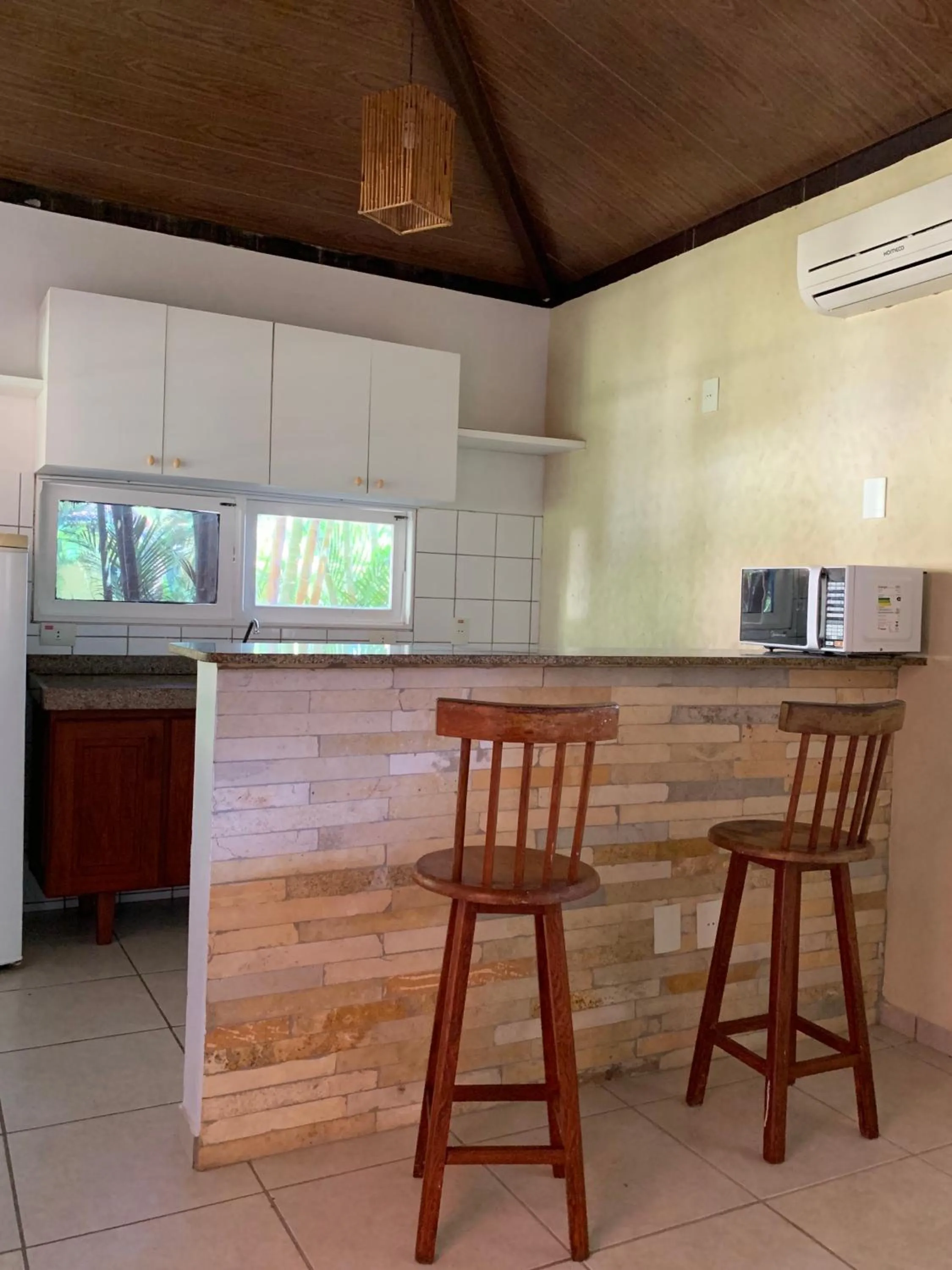 Kitchen or kitchenette in La Dolce Vita Flat & Pousada