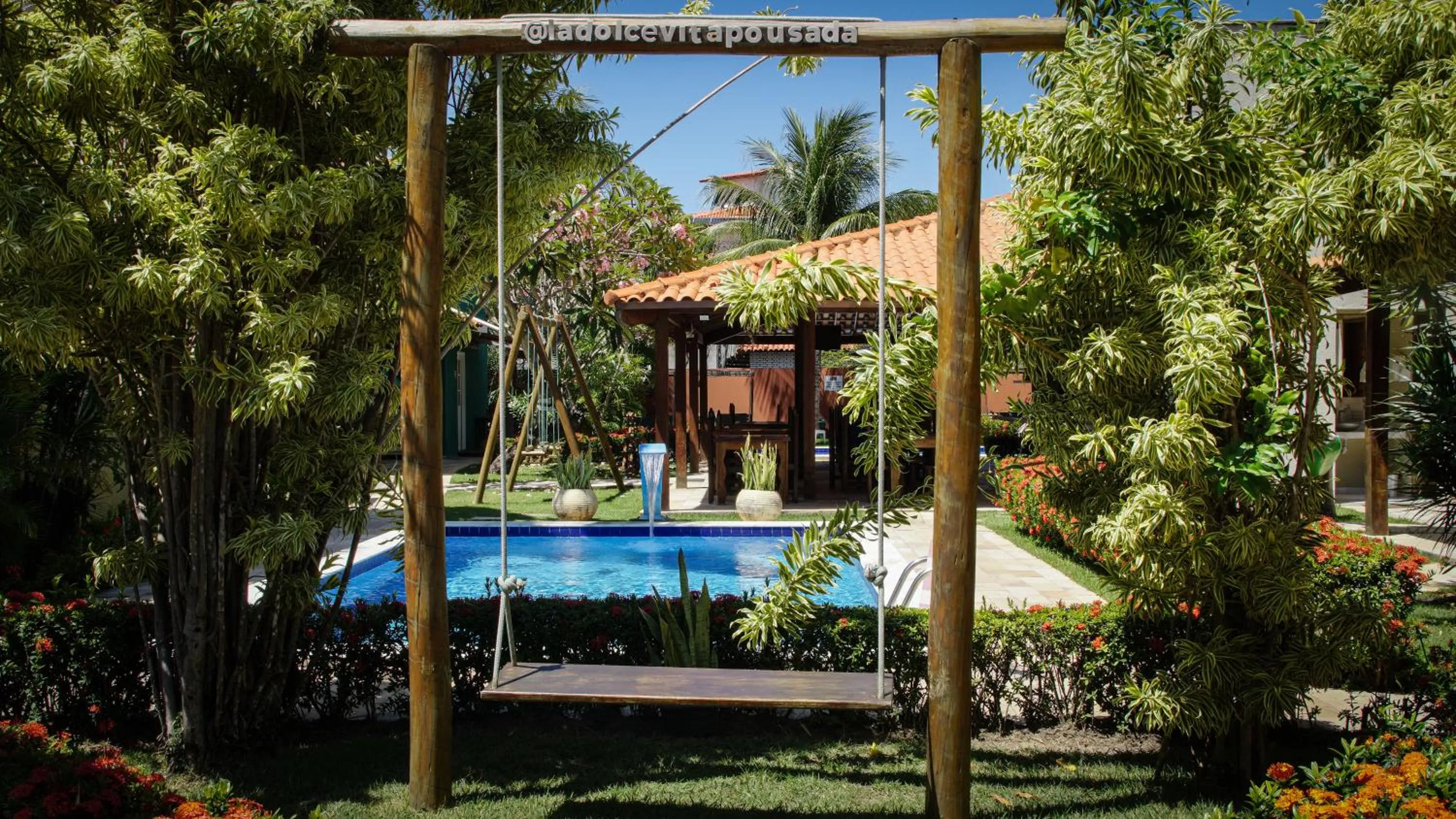 Swimming pool in La Dolce Vita Flat & Pousada