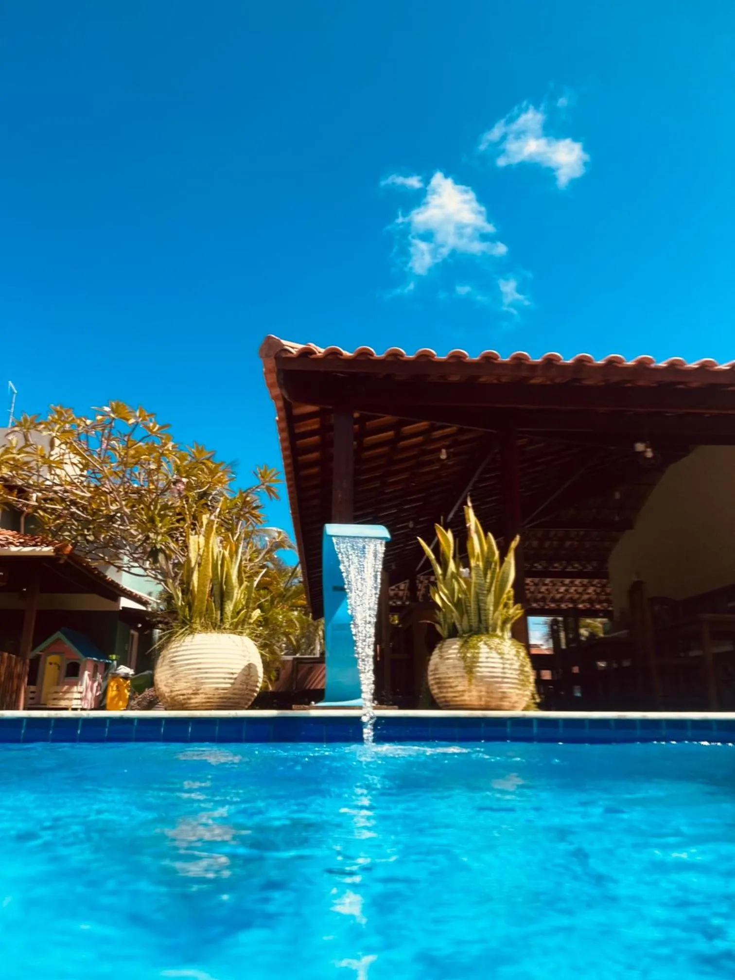 Swimming pool in La Dolce Vita Flat & Pousada