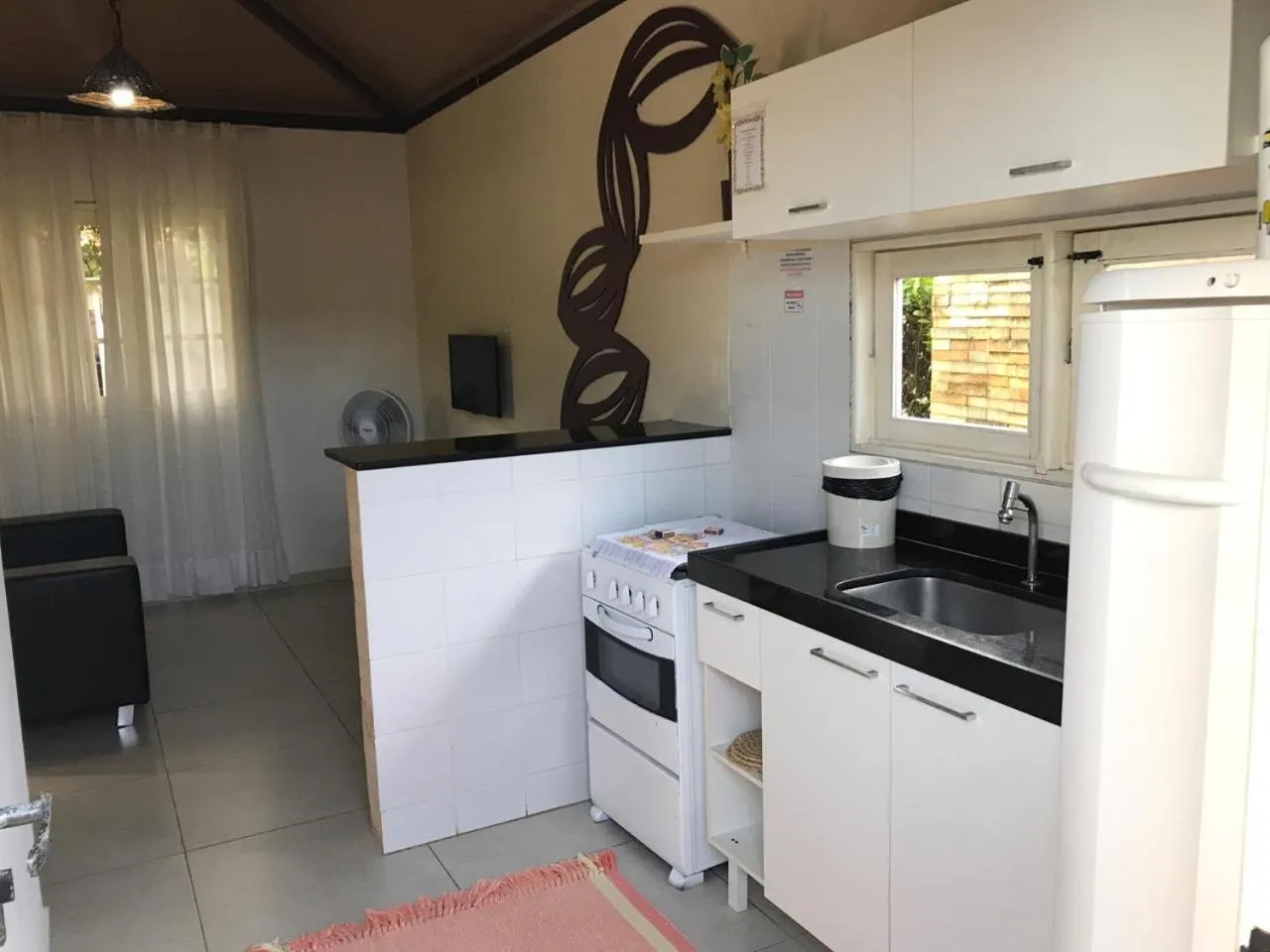 Kitchen or kitchenette in La Dolce Vita Flat & Pousada