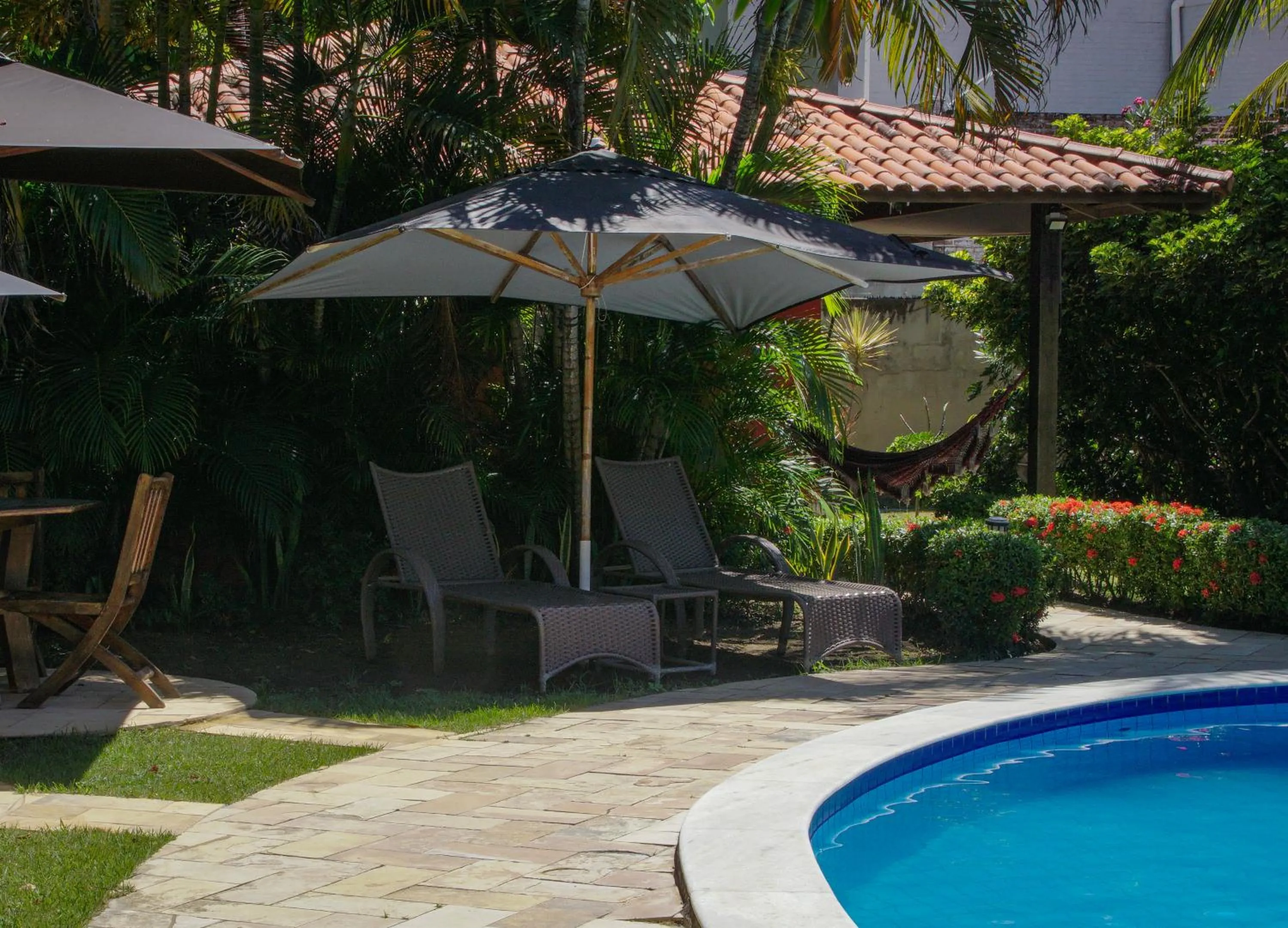 Swimming pool in La Dolce Vita Flat & Pousada