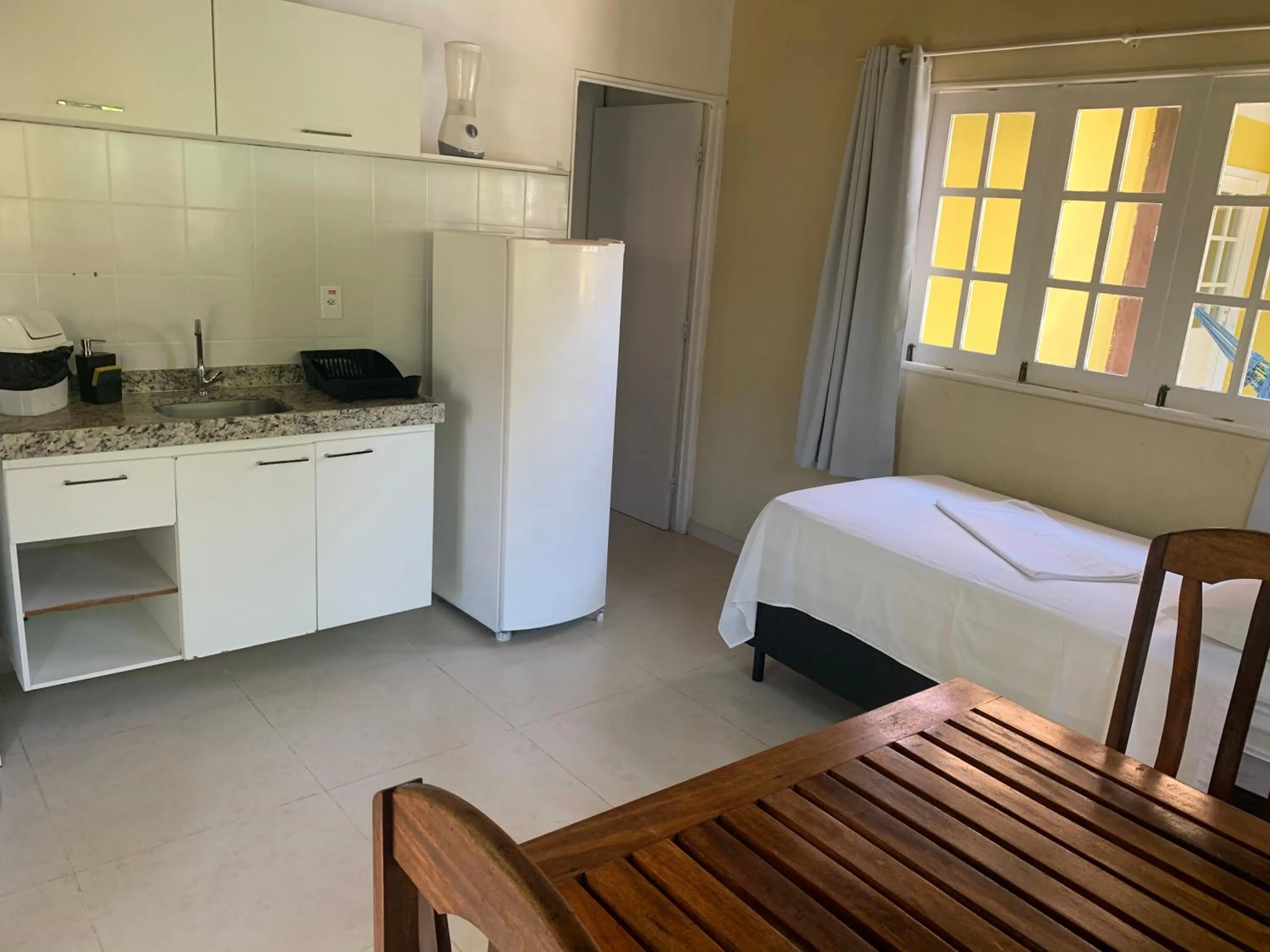 Kitchen or kitchenette in La Dolce Vita Flat & Pousada