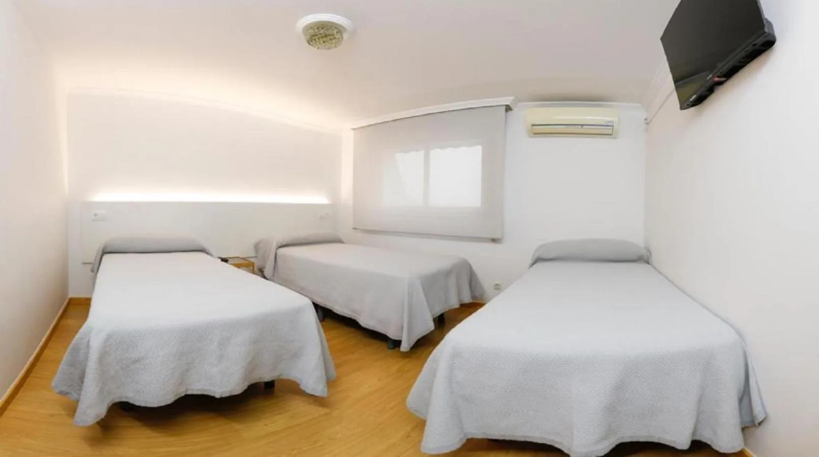 Bed in Pensión Venus