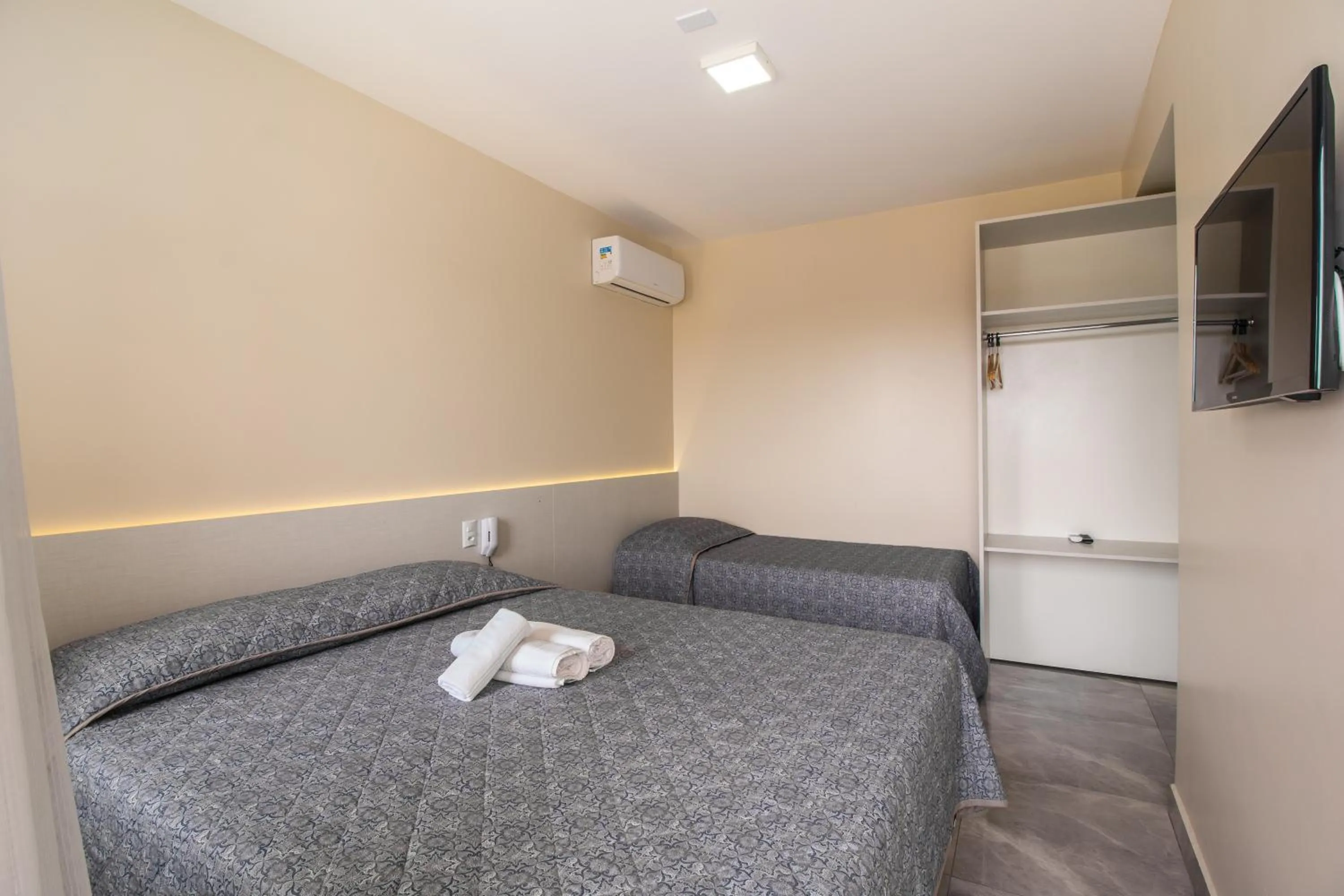 Bed in Pousada Espindola