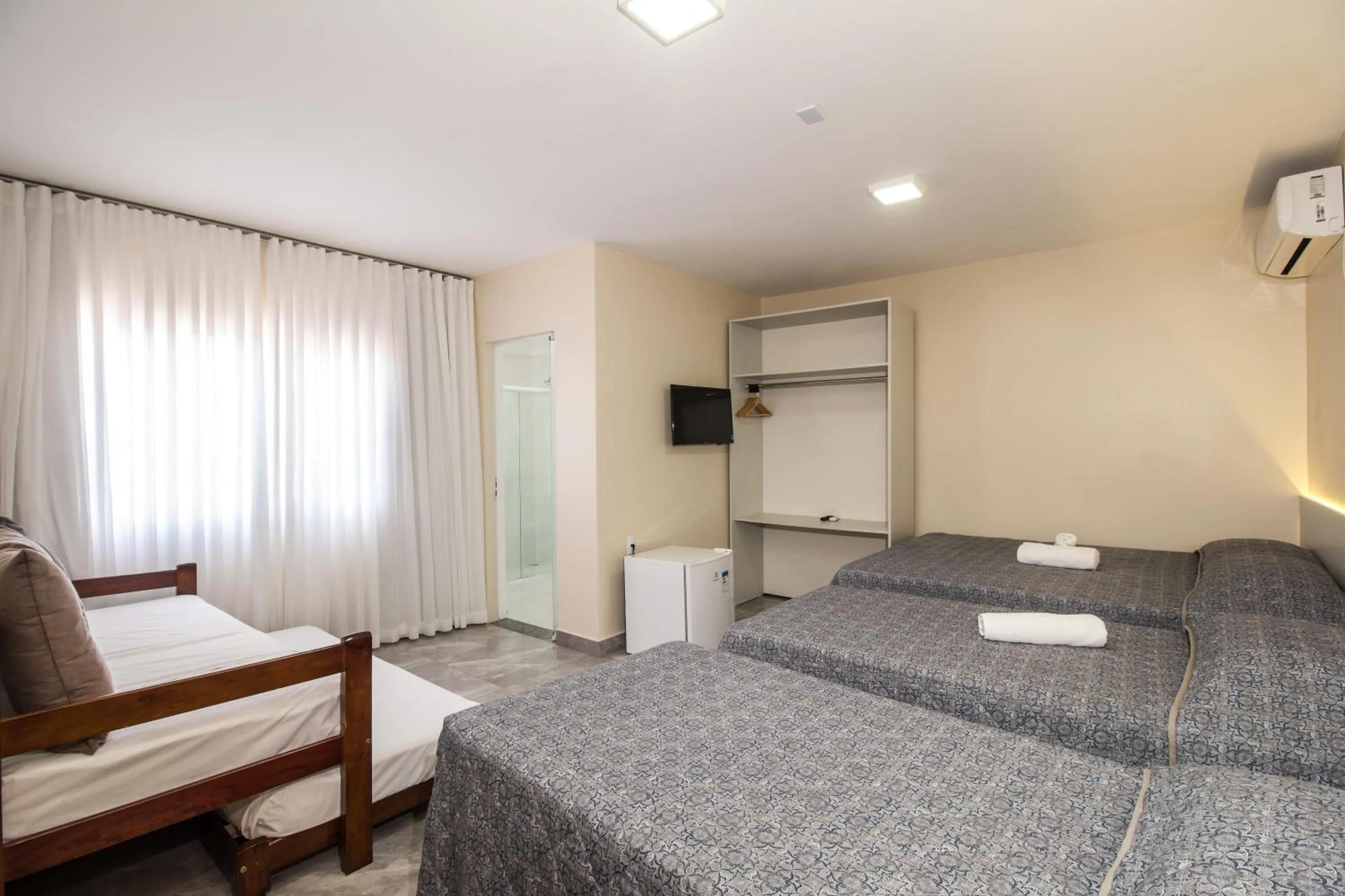 Bed in Pousada Espindola