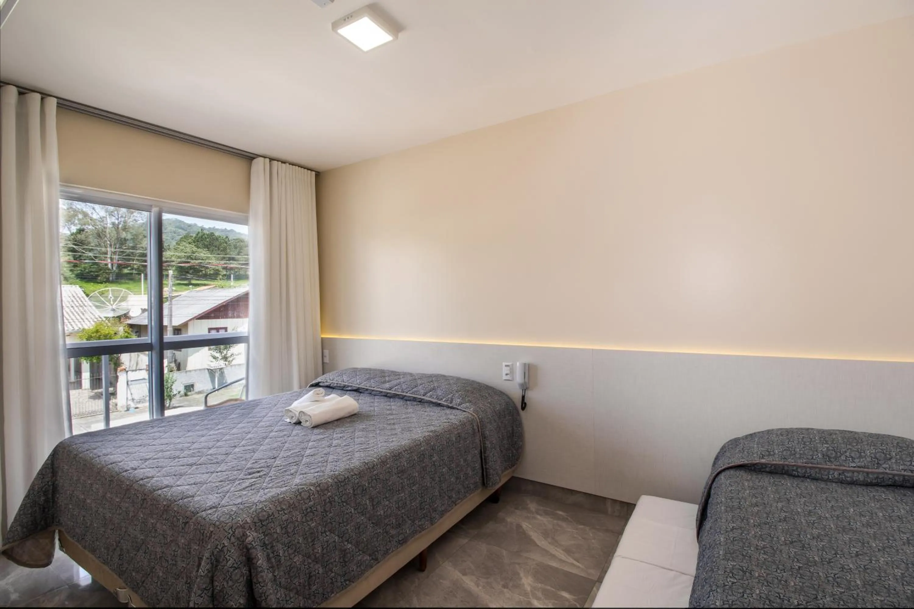 Bed in Pousada Espindola