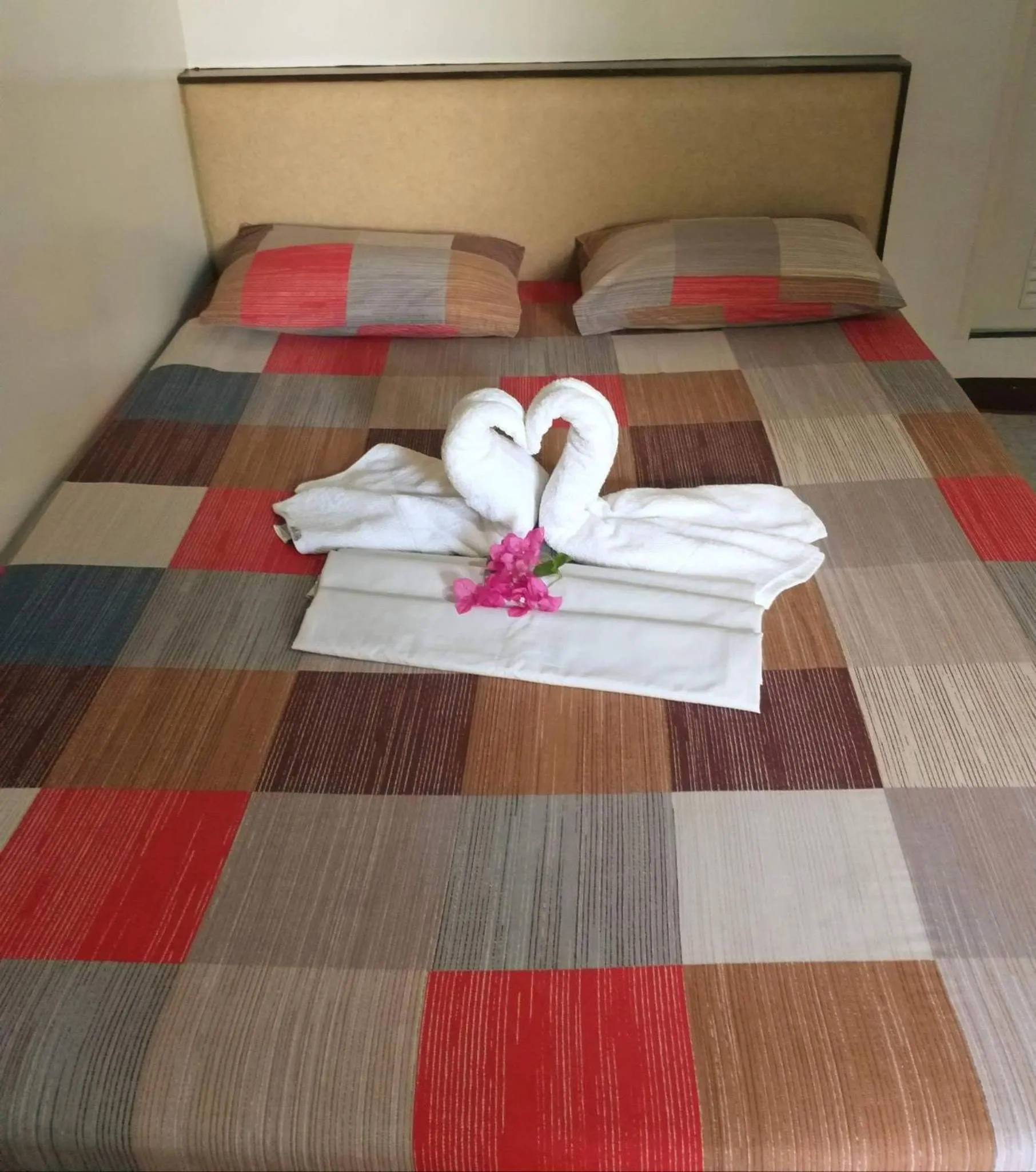 Bed in Park Vil-la Apartelle