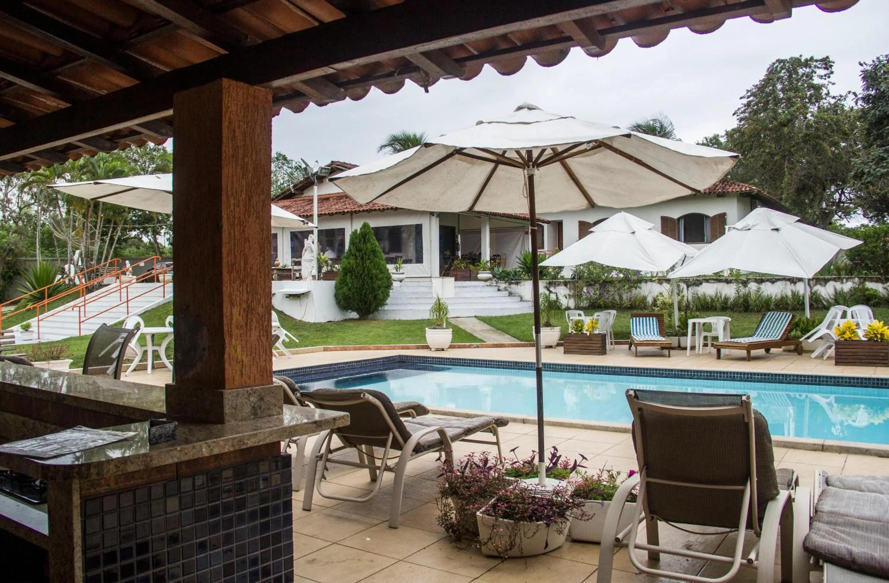 Swimming pool in Pousada Doce Vida Guarapari