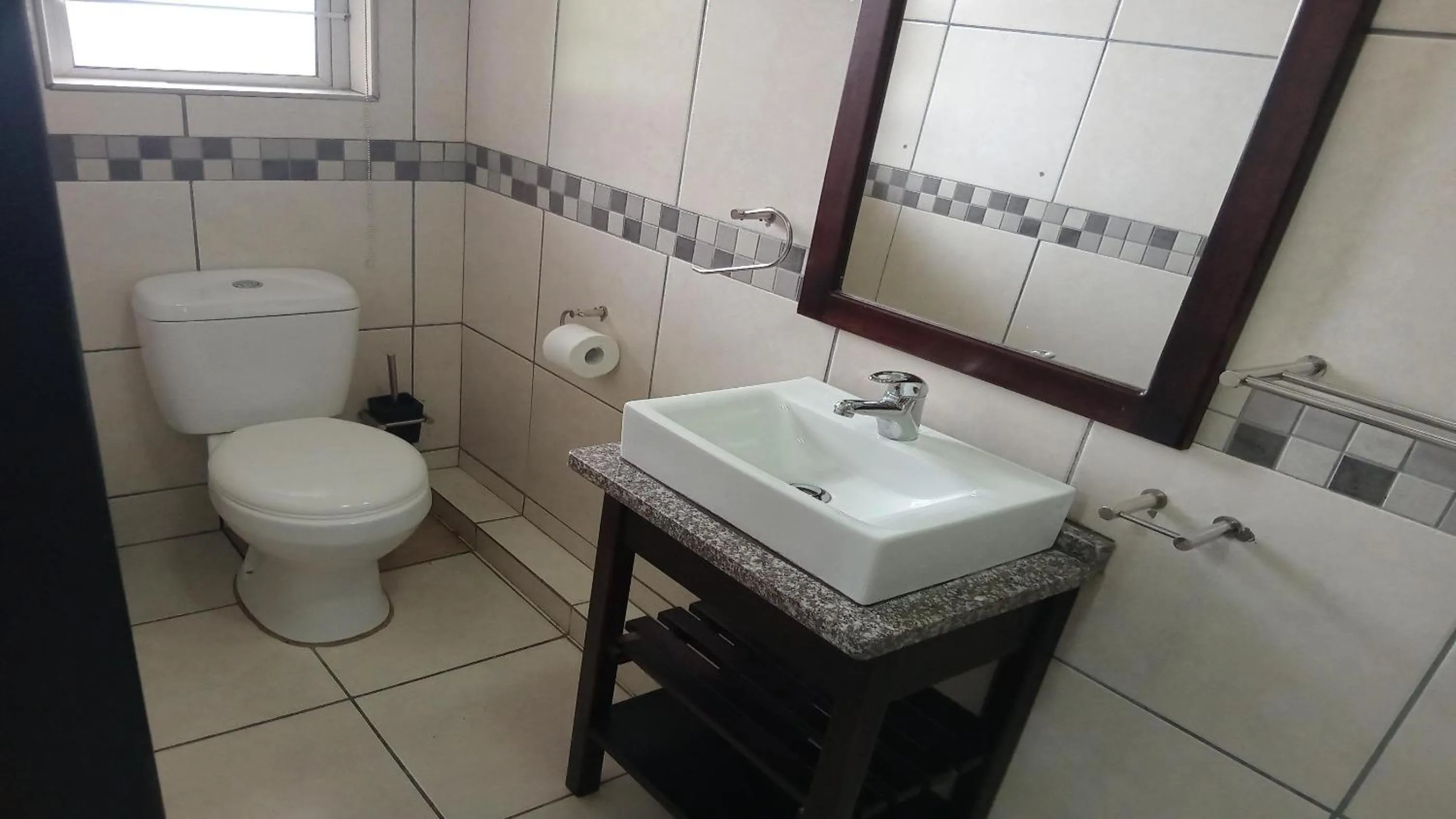 Toilet in Sunrise Beach Resort