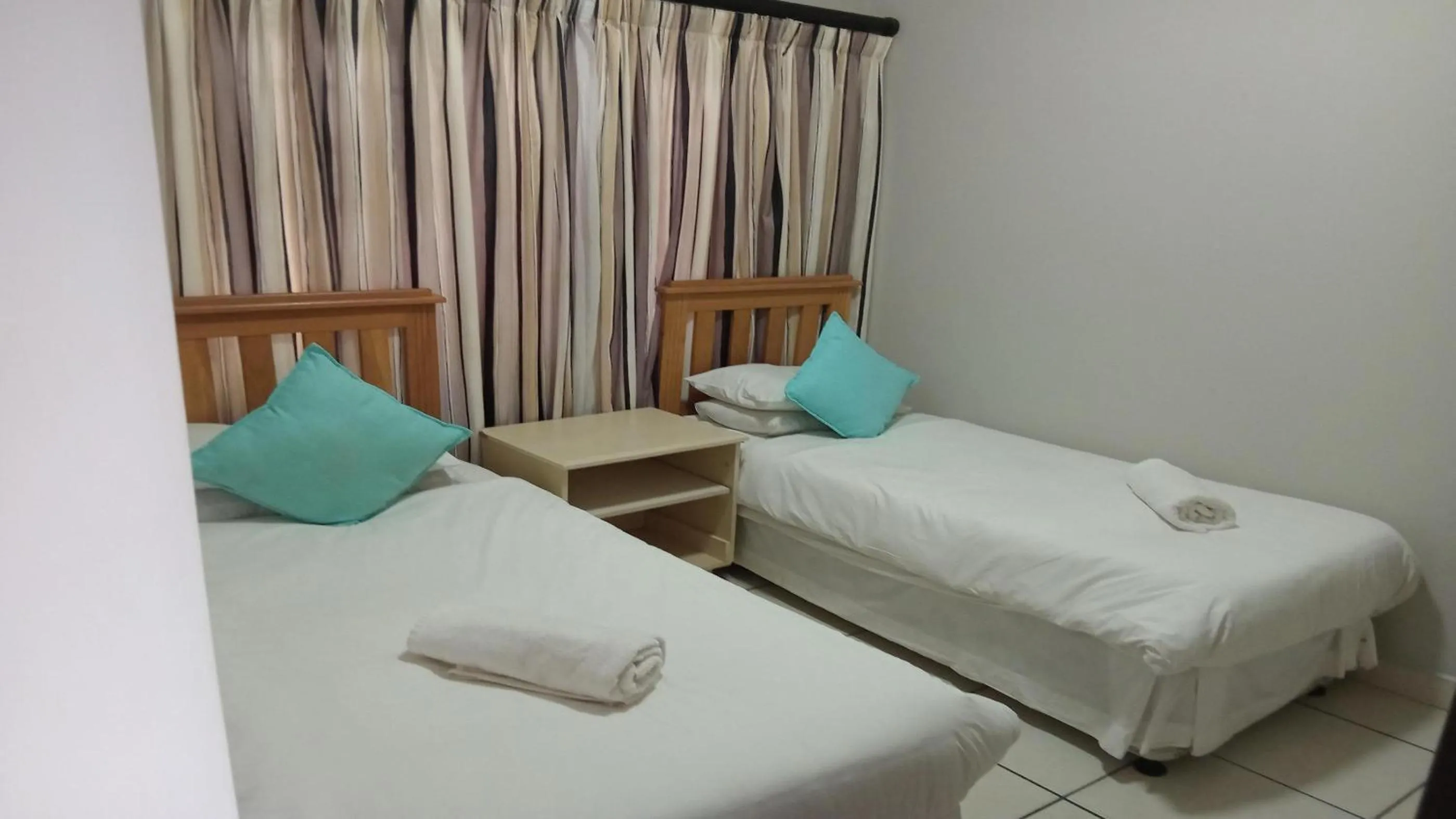 Photo of the whole room, Bed in Sunrise Beach Resort
