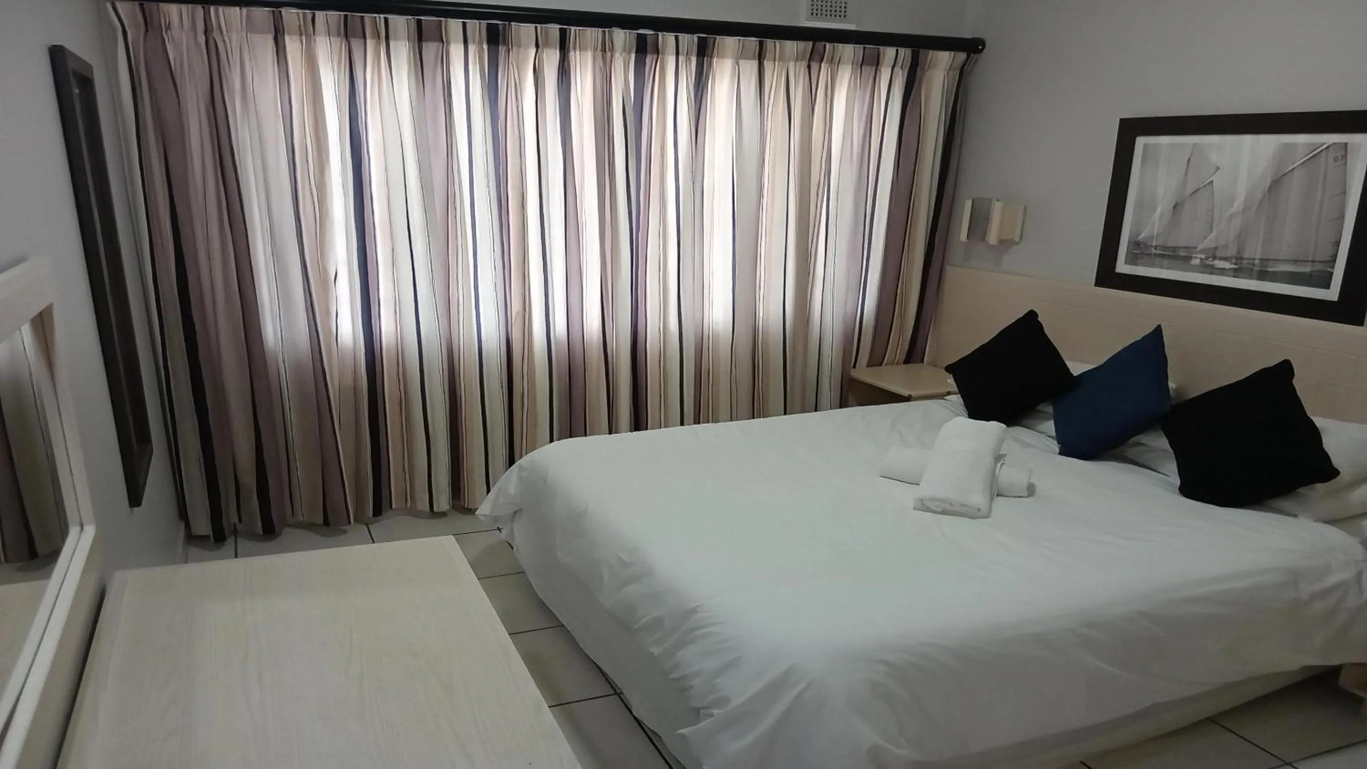 Bed in Sunrise Beach Resort