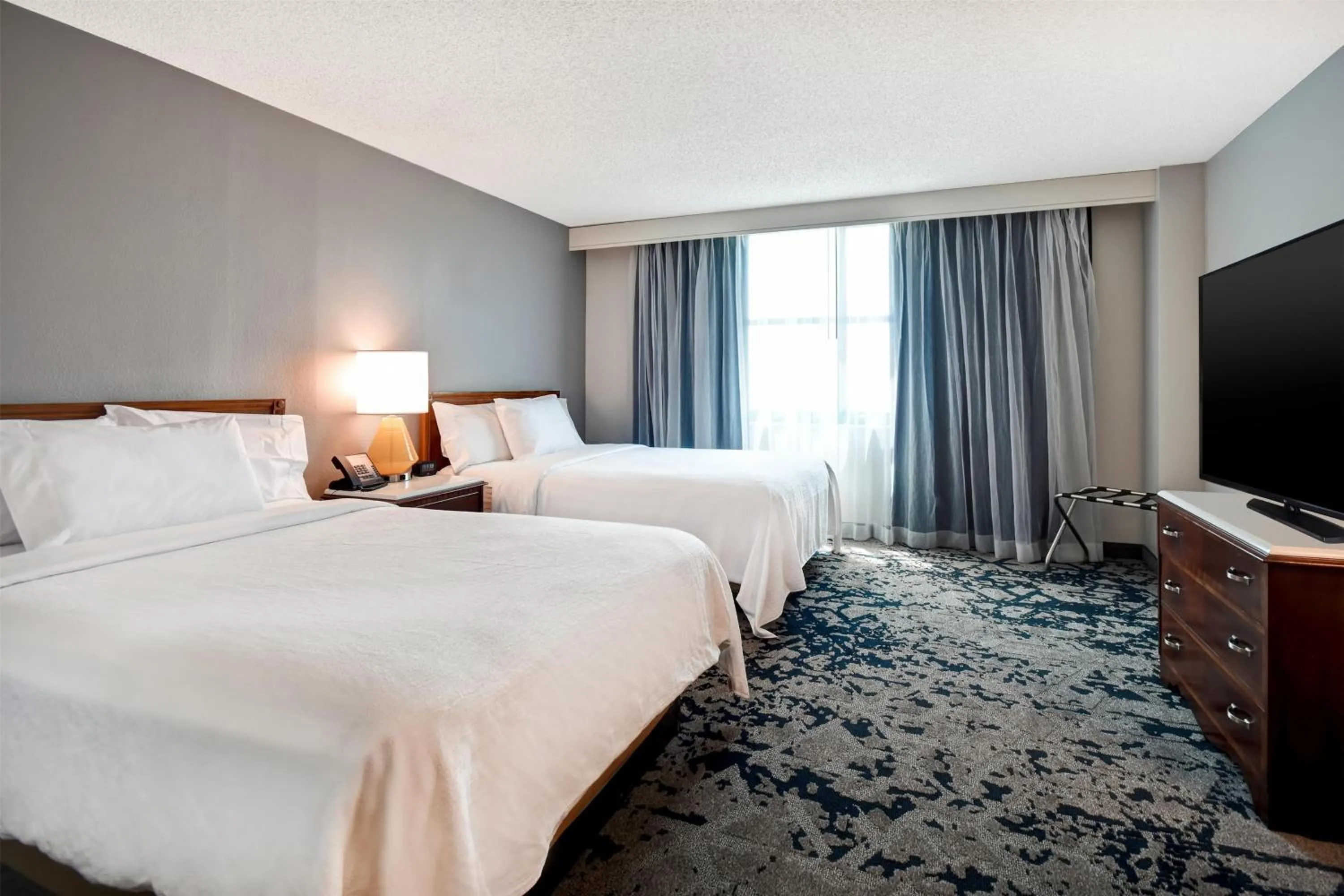 Bed in Embassy Suites Montgomery - Hotel & Conference Center