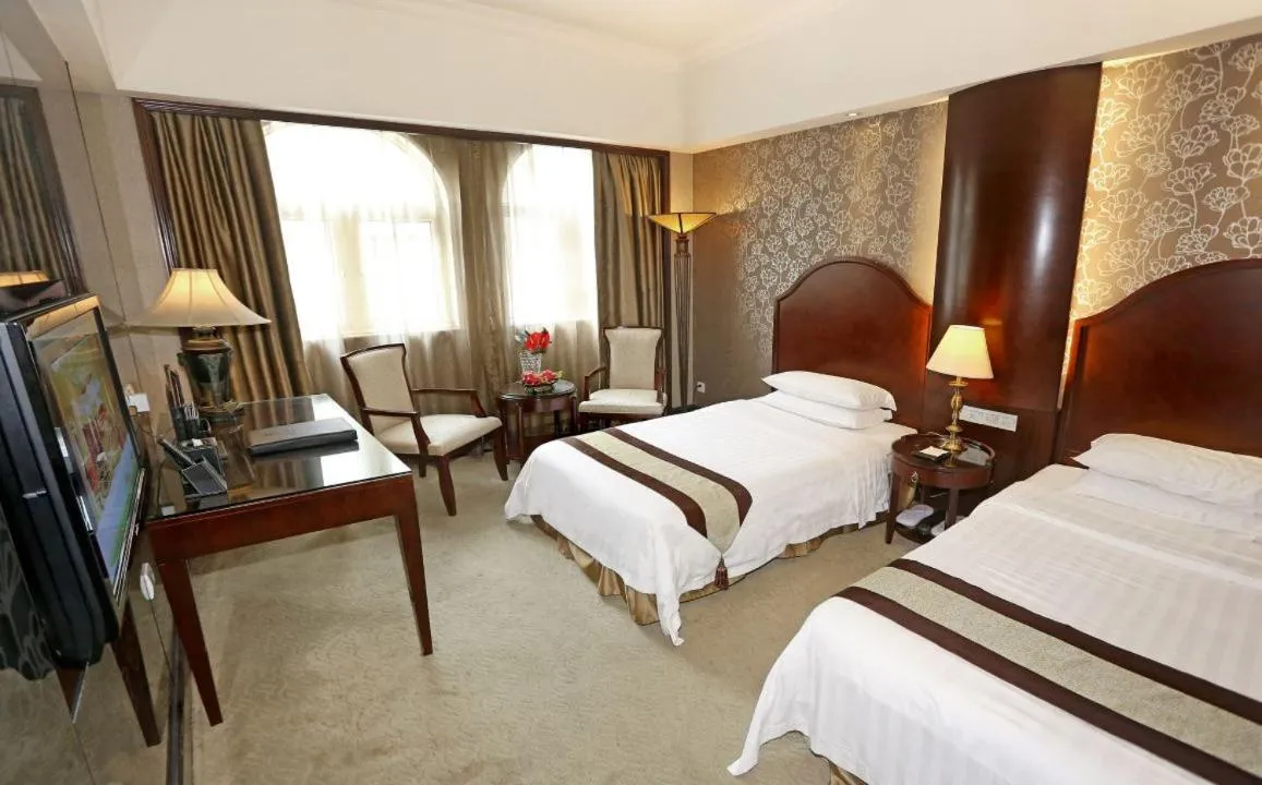 Bed in Grand Palace Hotel - Grand Hotel Management Group