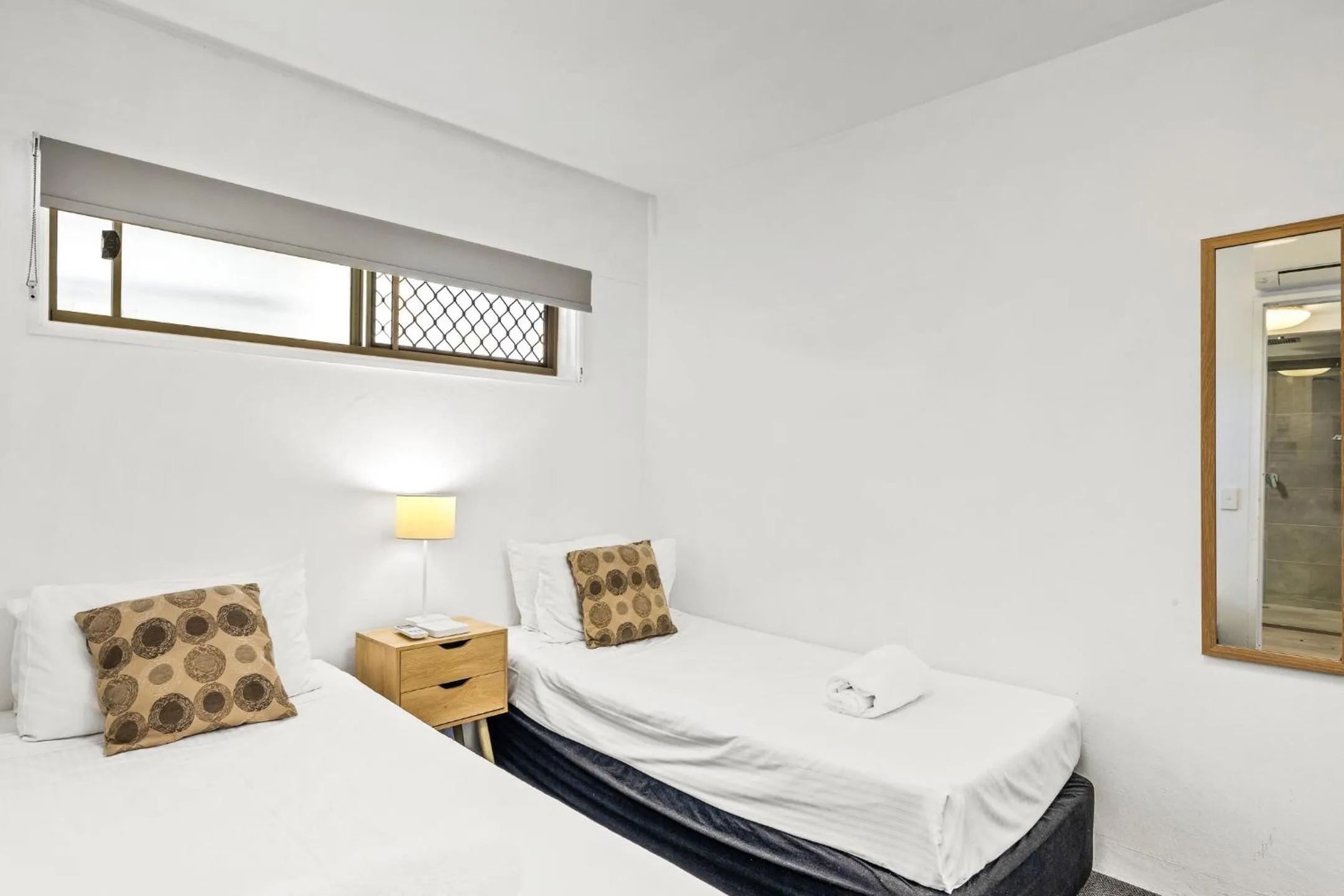 Bed in Maroochy Sands Holiday Apartments