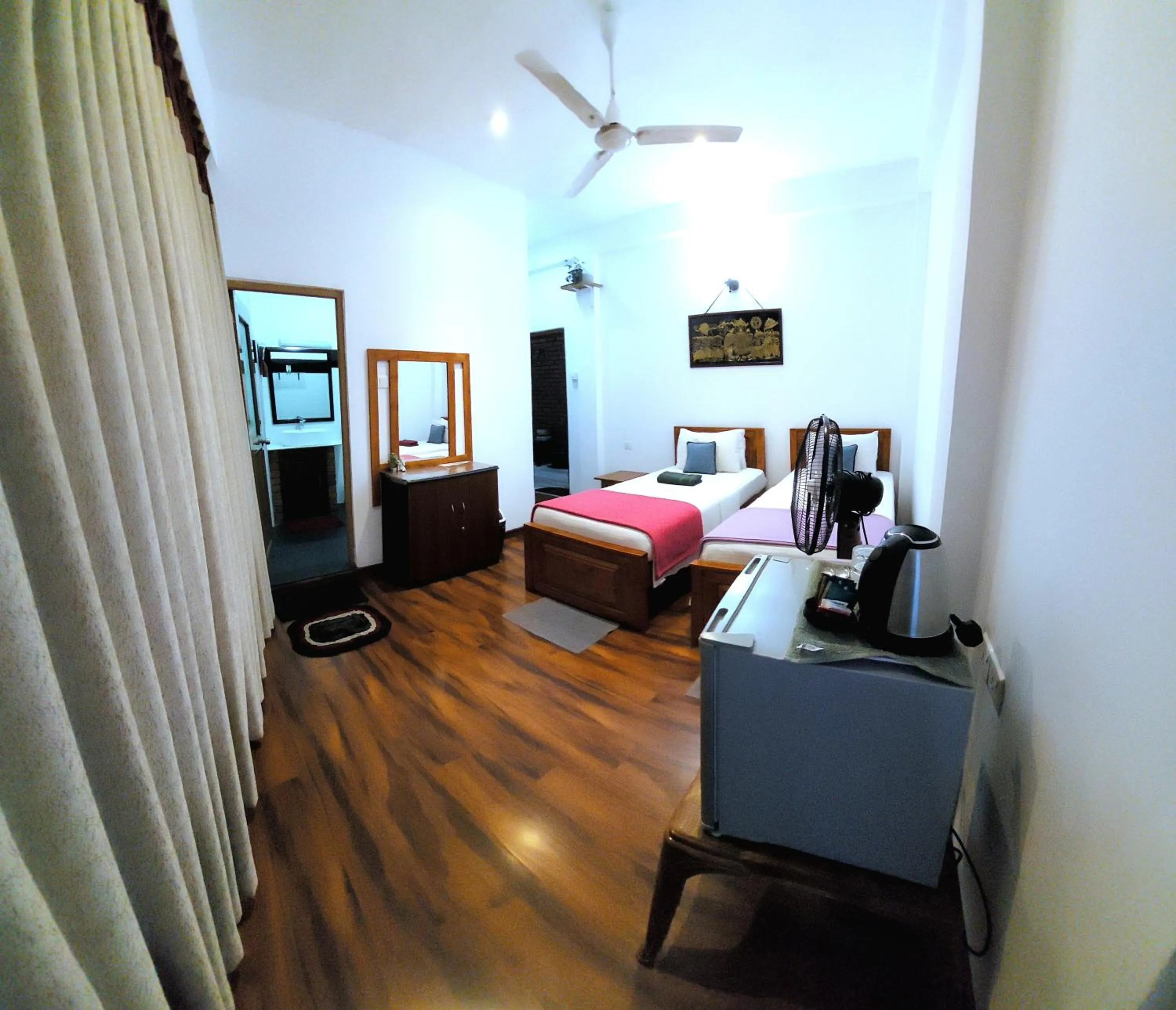 Photo of the whole room, Bed in Poomaz Peace Palace