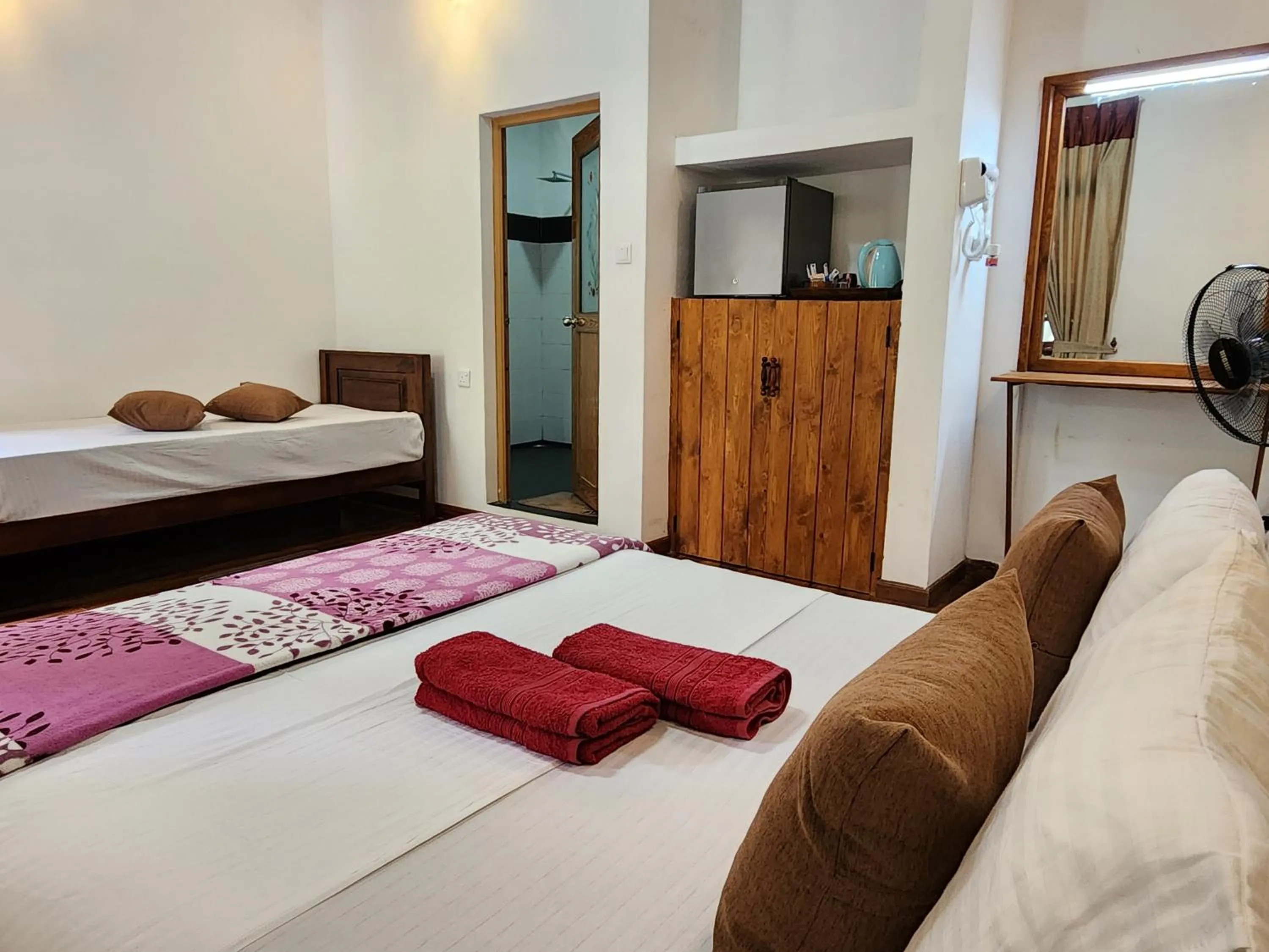 Bed in Poomaz Peace Palace