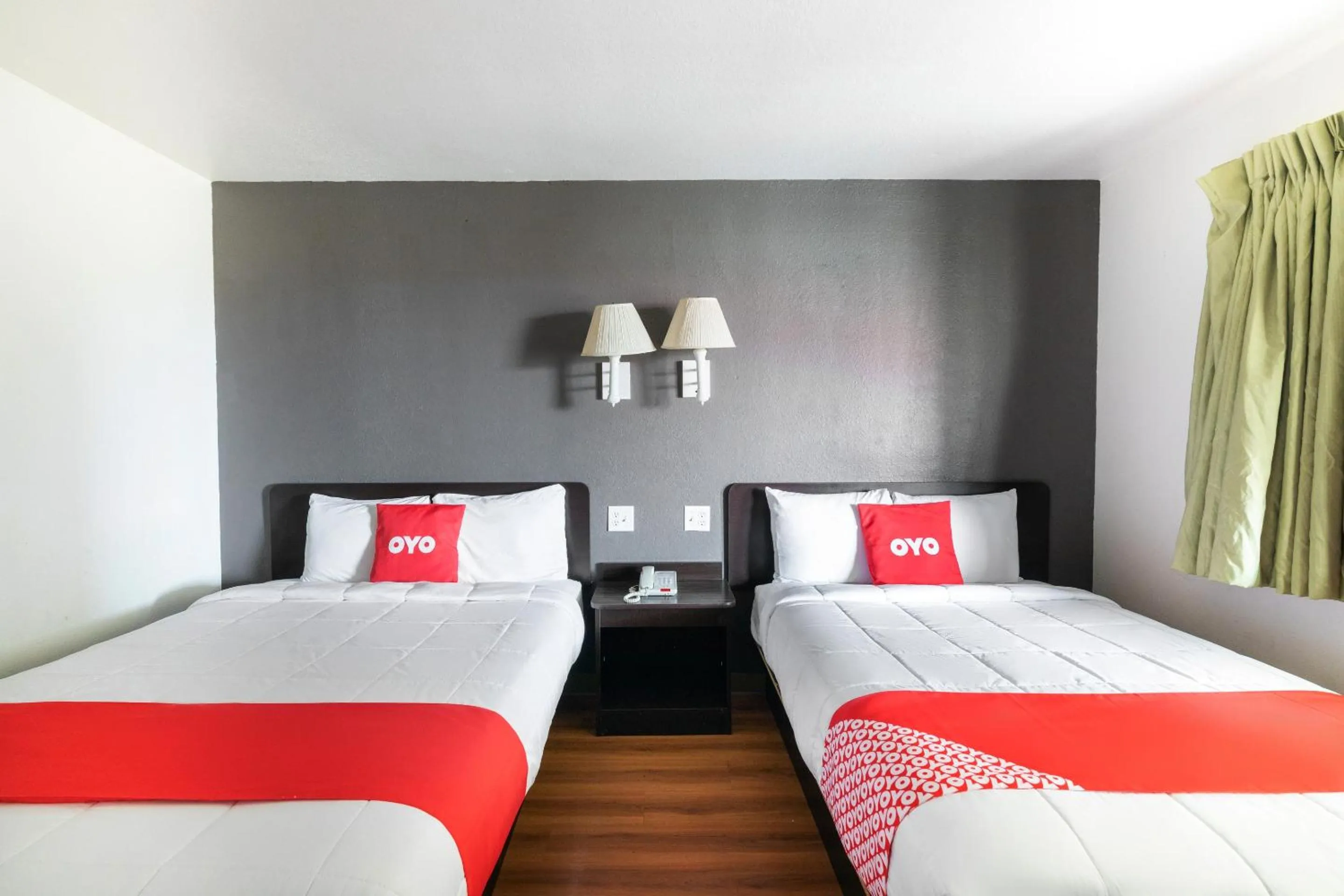 Bedroom, Bed in OYO Hotel Irving DFW Airport North