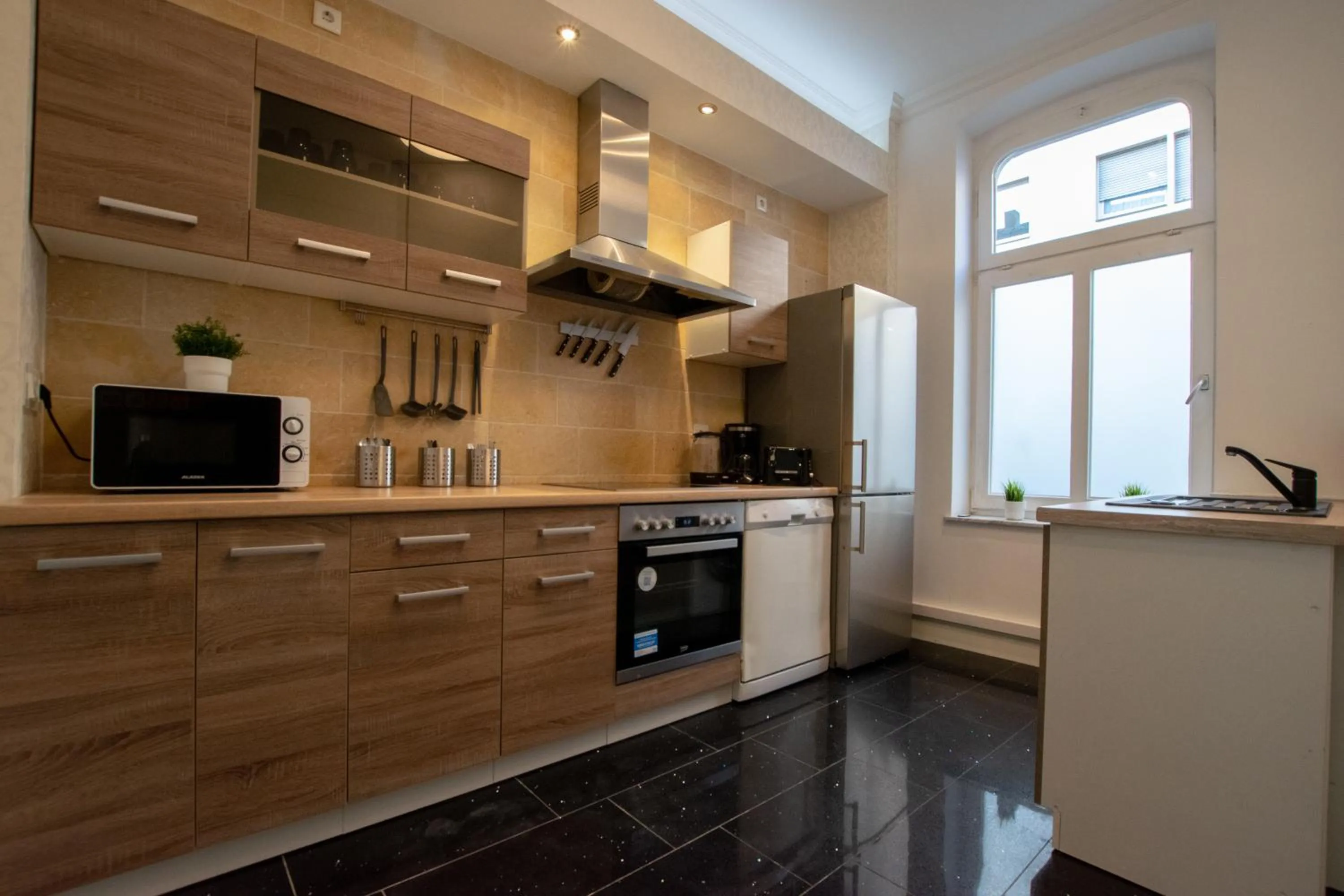 Kitchen or kitchenette in Central City Villa