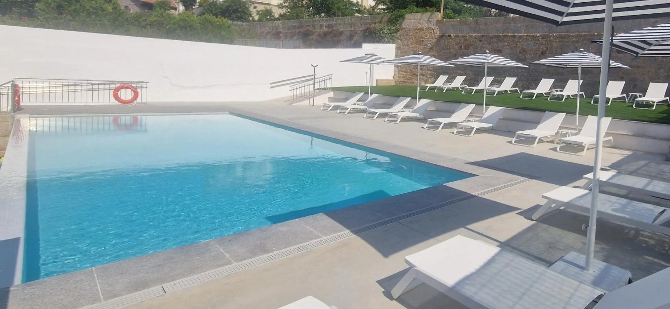 Swimming pool in La Suite Hotel