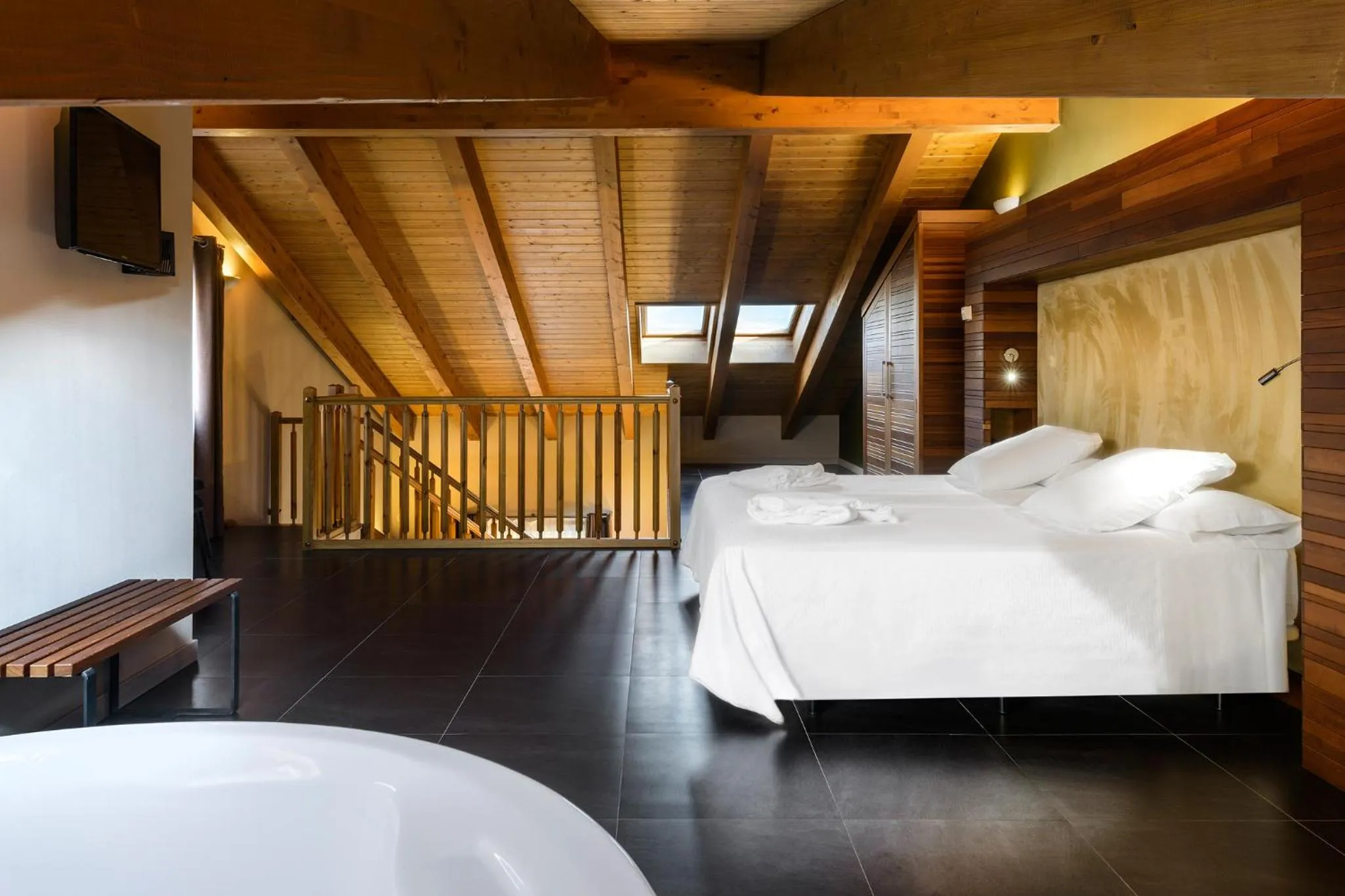 Bedroom, Bed in Hotel Spa Aguas de los Mallos