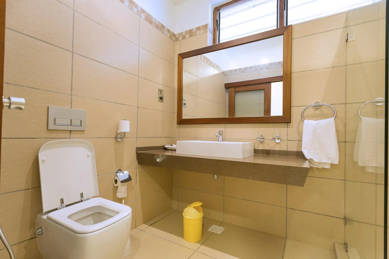 Toilet in Travellers Beach Hotel & SPA