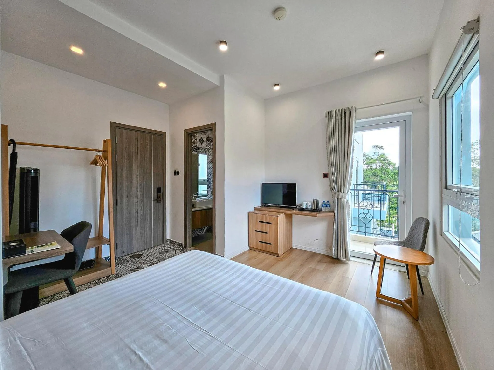 Communal lounge/ TV room, Bed in NATURE LAND 2 - Song Anh Hotel Dalat