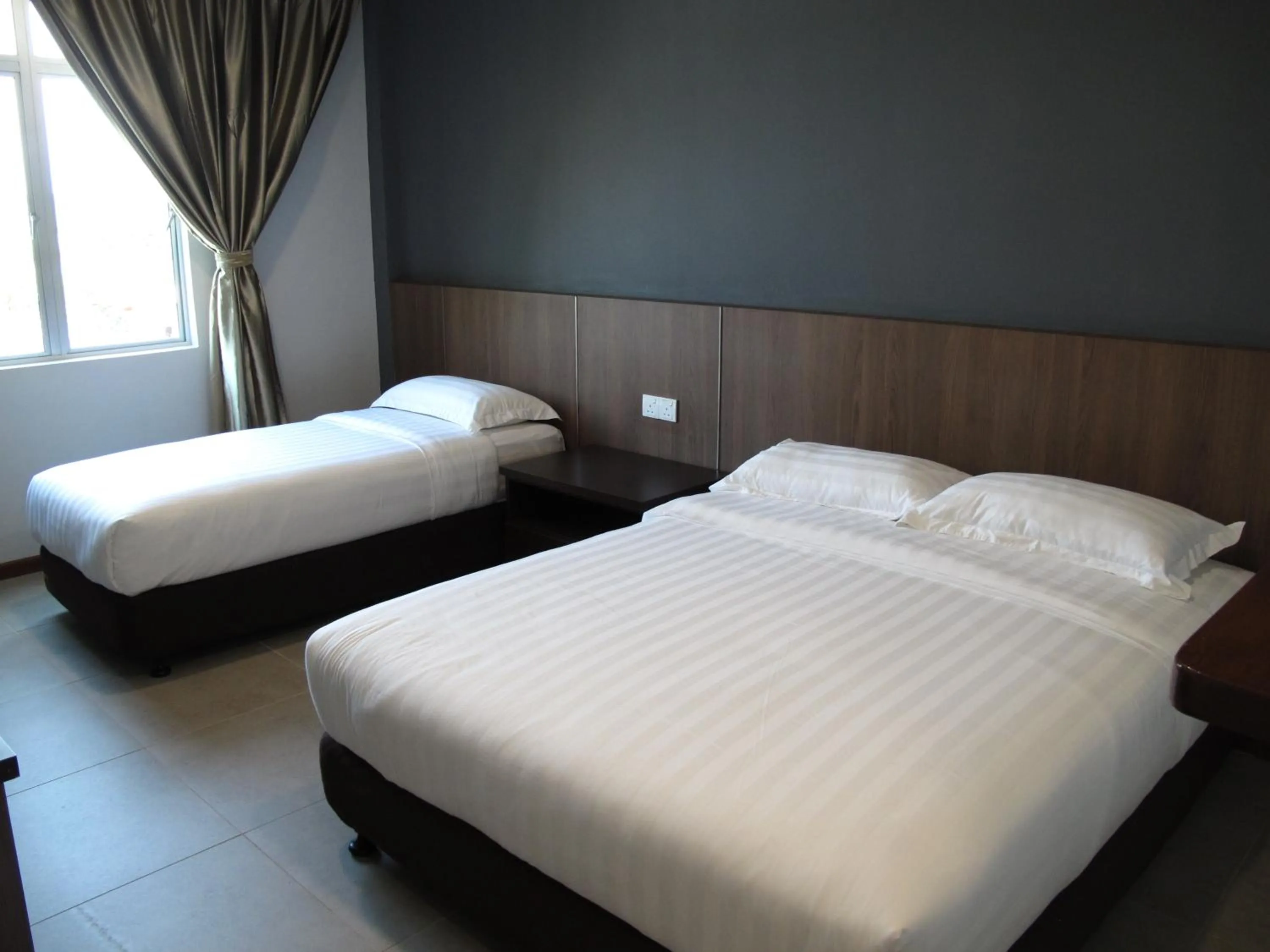 Bed in HOTEL SUKARAMAI