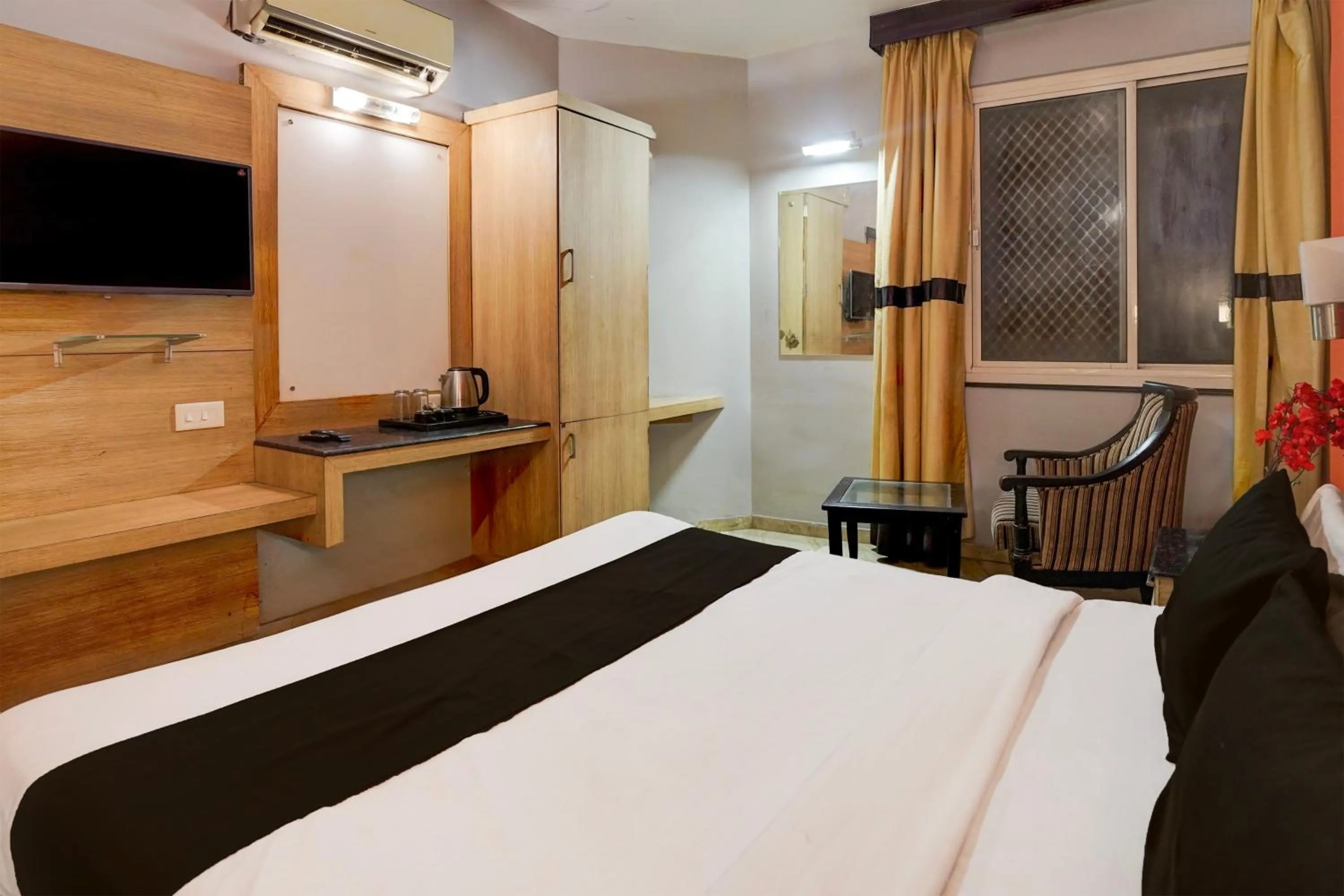 Bedroom, Bed in Super Townhouse Bani Park Formerly Aroma Residency