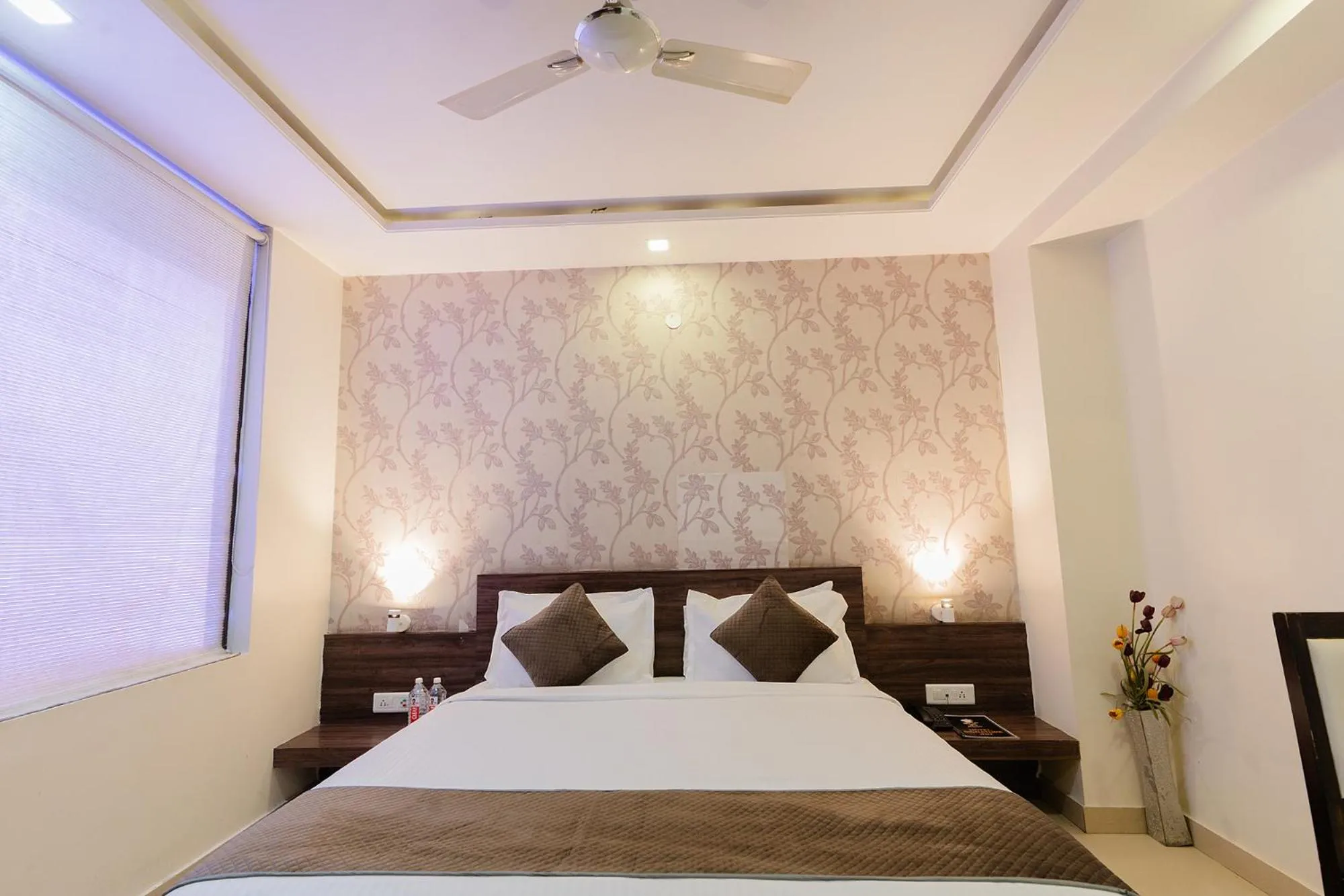 Bed in FabHotel Signature Inn