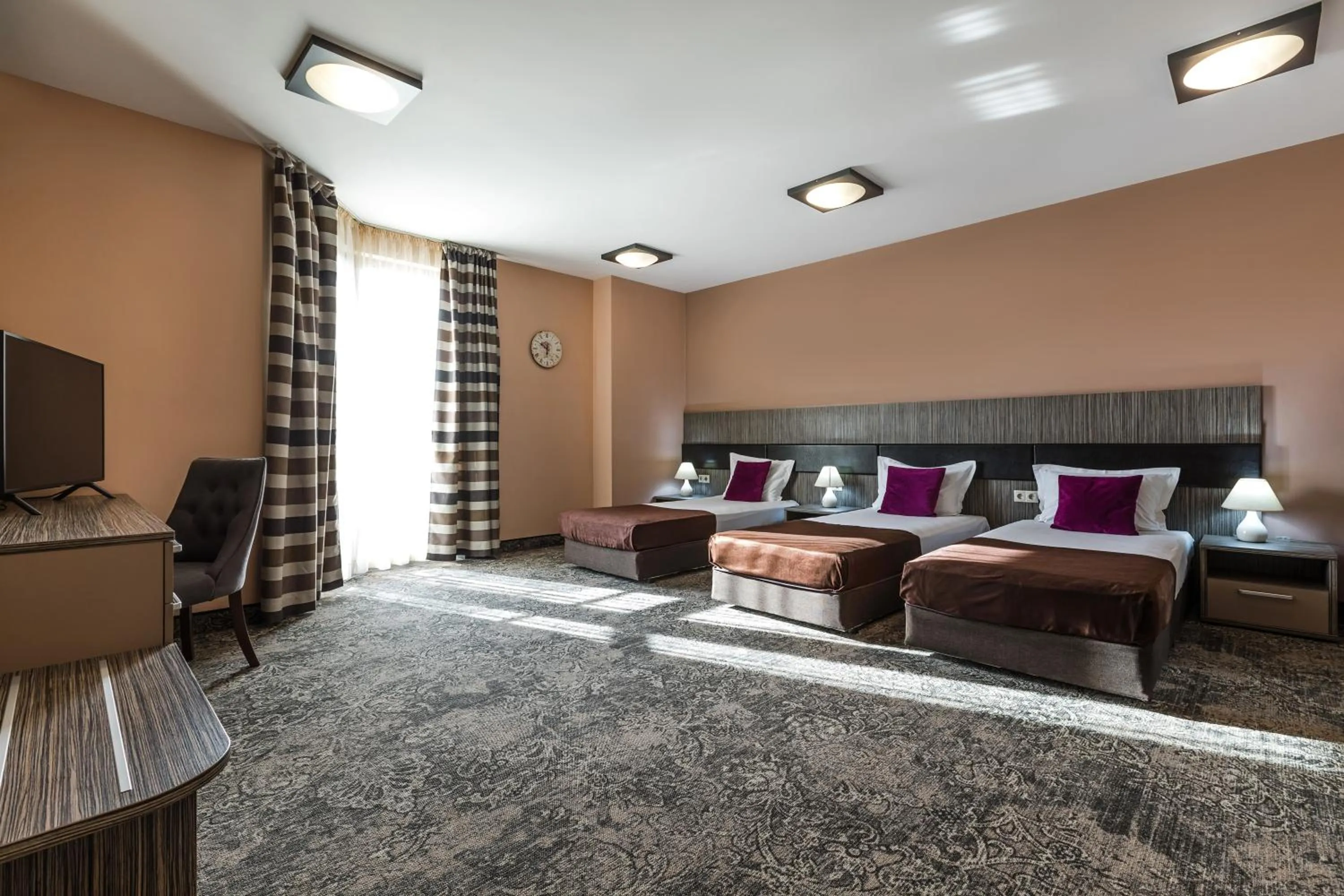 Photo of the whole room in Plaza Hotel Plovdiv - Free Parking