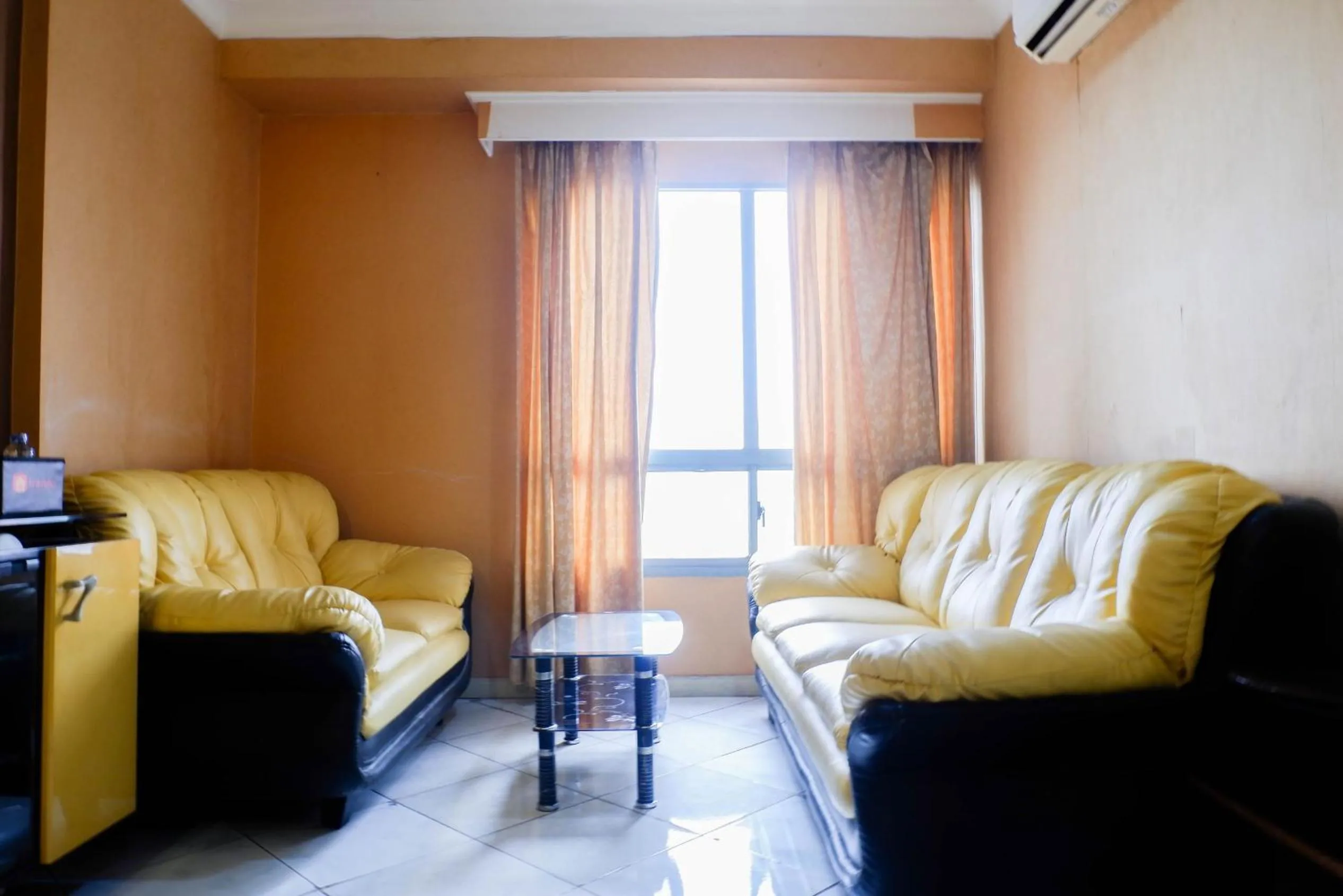 Living room in Spacious 1BR Apartment at Taman Beverly By Travelio