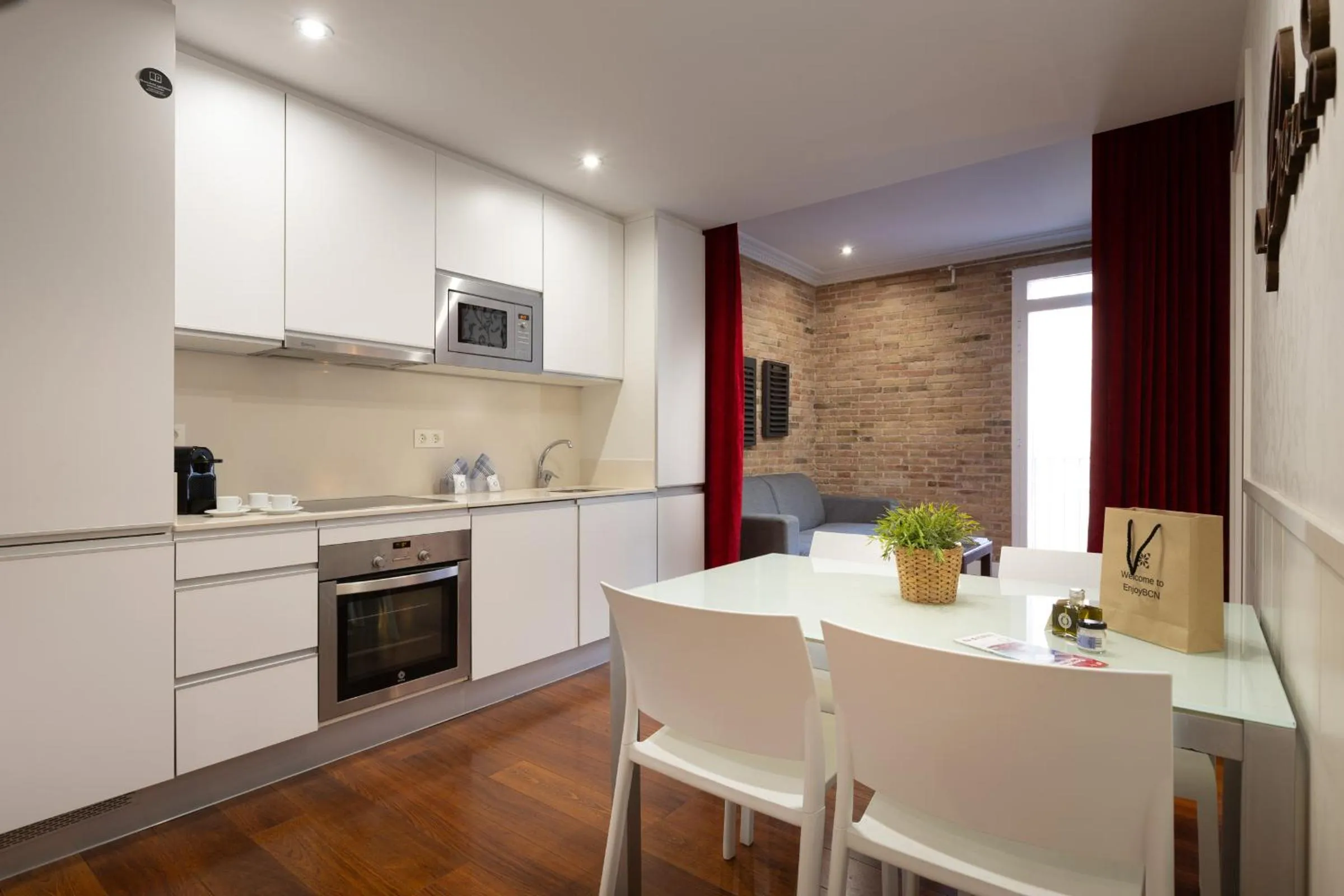 Kitchen or kitchenette in Enjoybcn Gaudi Apartments