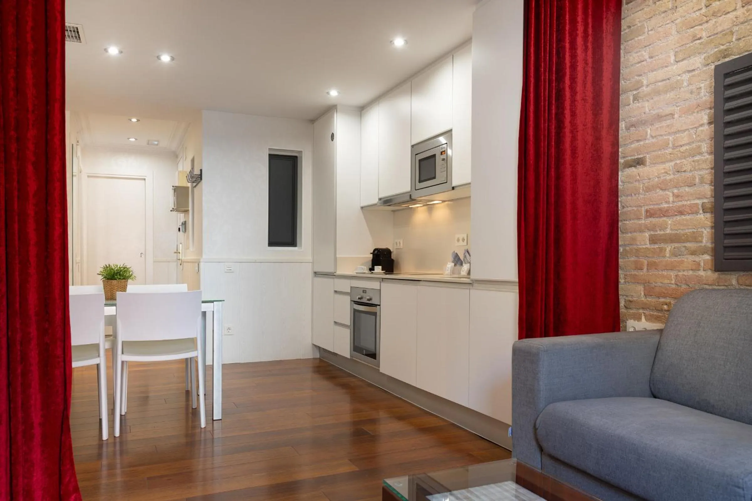 Kitchen or kitchenette in Enjoybcn Gaudi Apartments