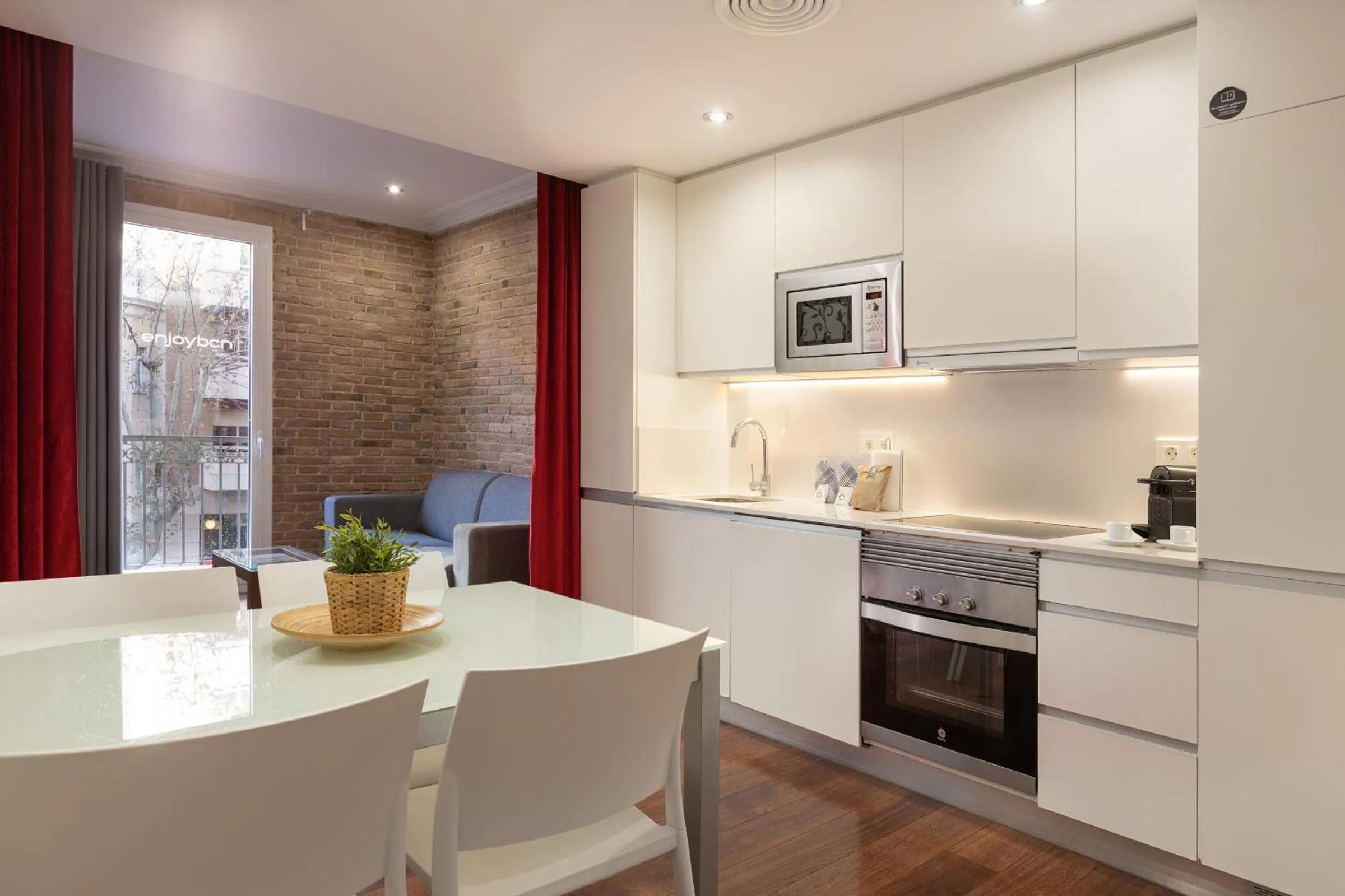 Kitchen or kitchenette in Enjoybcn Gaudi Apartments