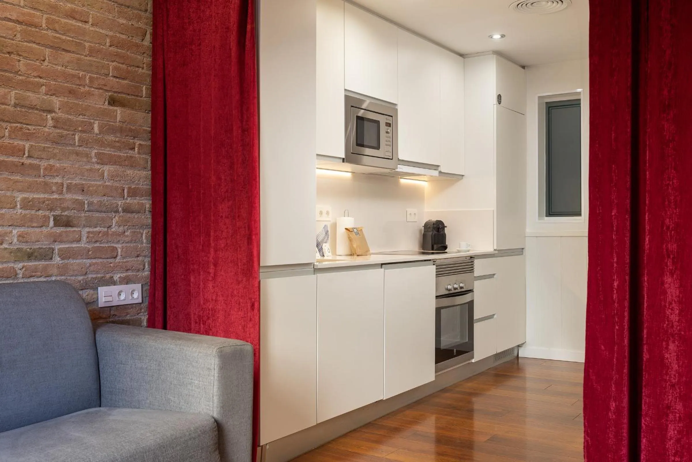 Kitchen or kitchenette in Enjoybcn Gaudi Apartments