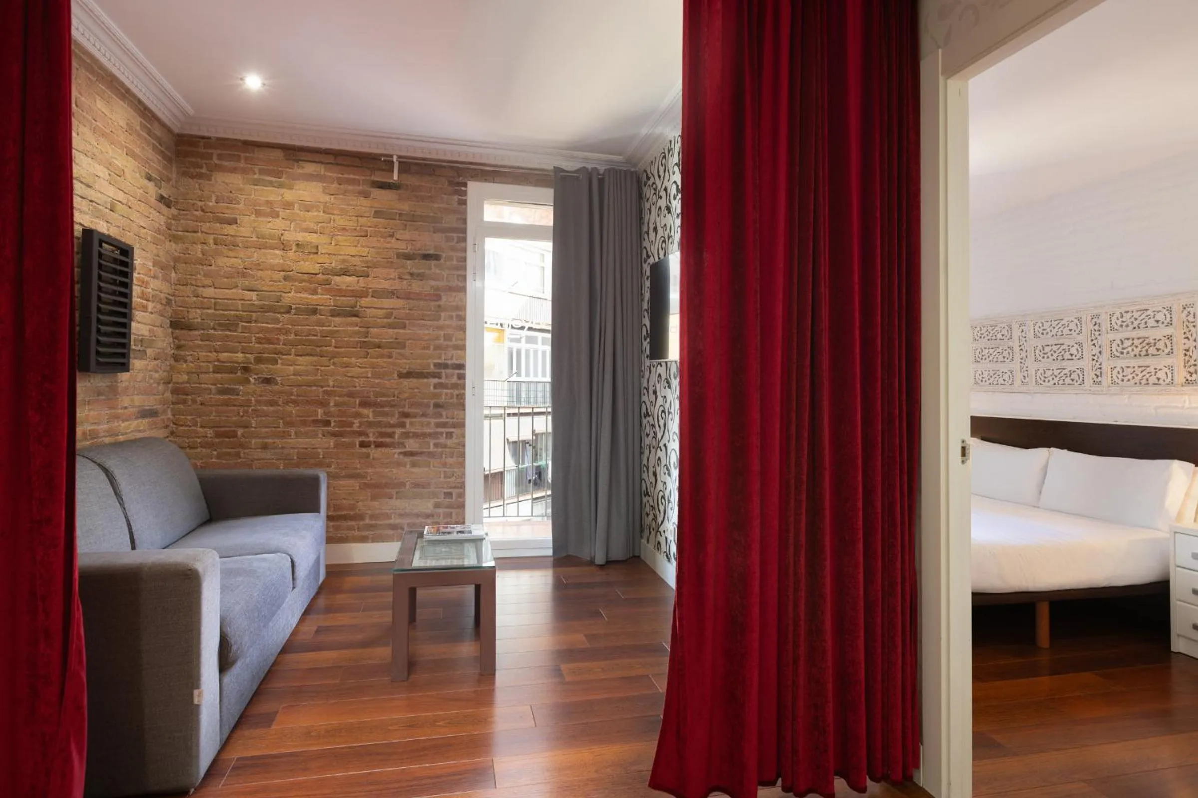 Living room, Bed in Enjoybcn Gaudi Apartments