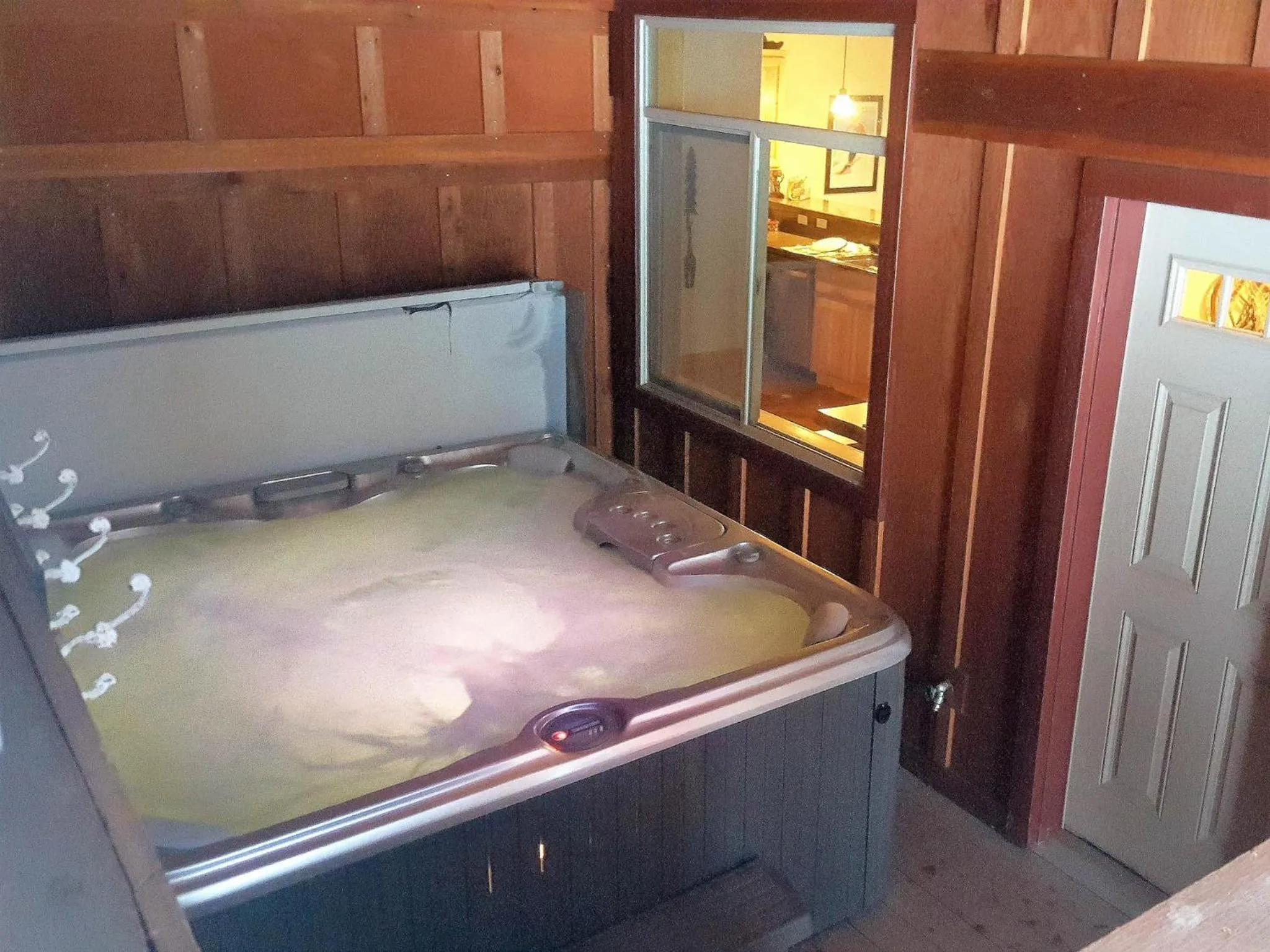 Bed in Spacious Sandpoint Chalet with Hot Tub Views