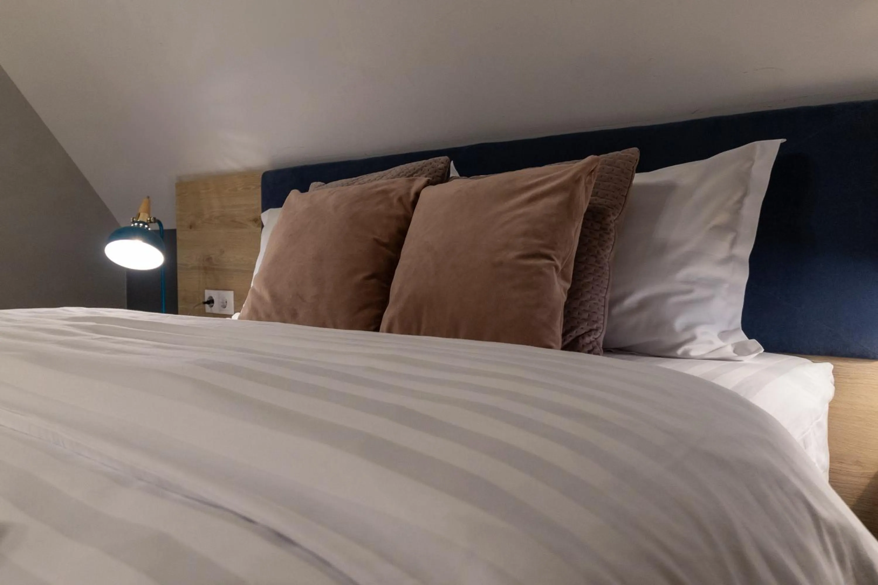 Bed in Lumiere House Sibiu