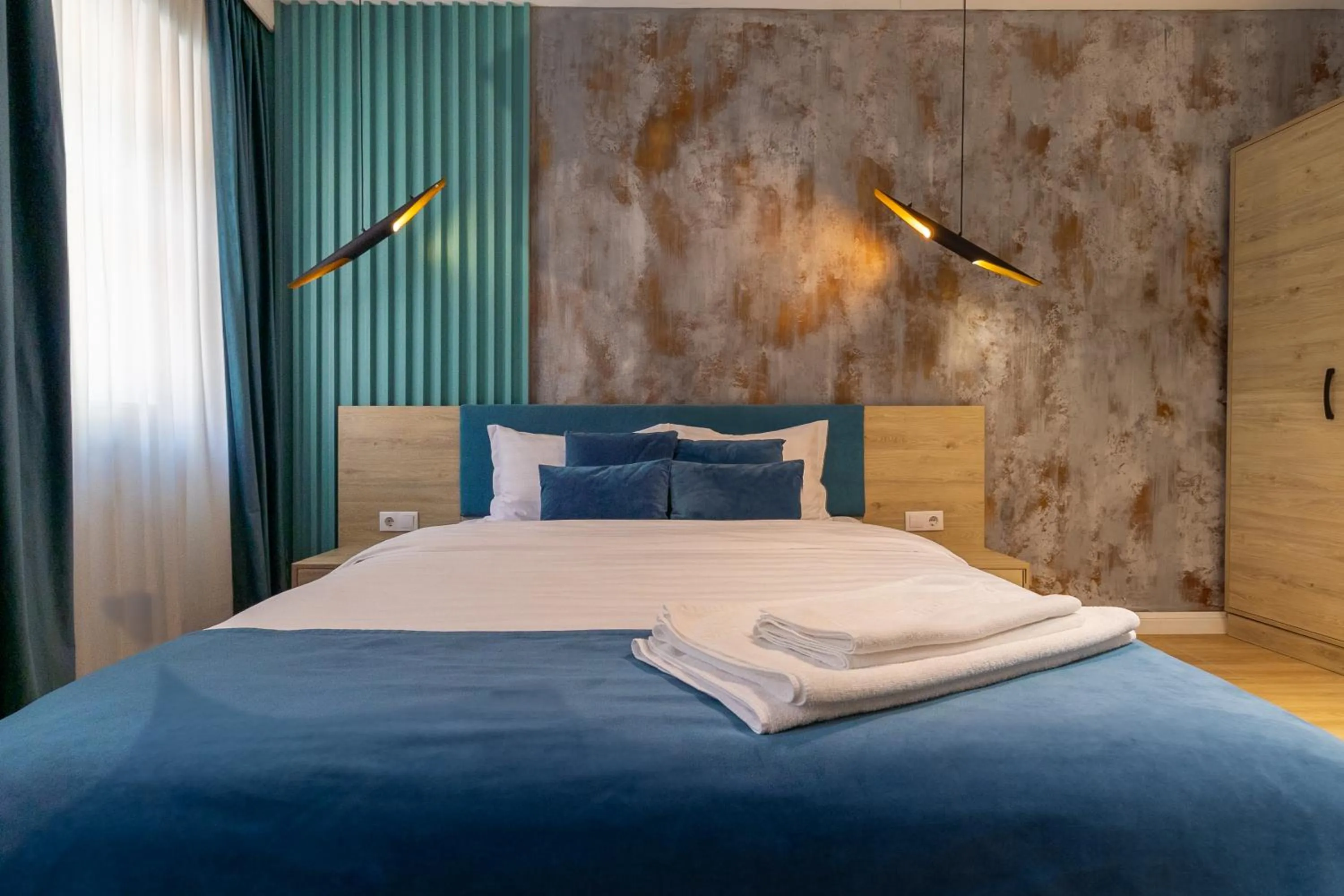 Bed in Lumiere House Sibiu