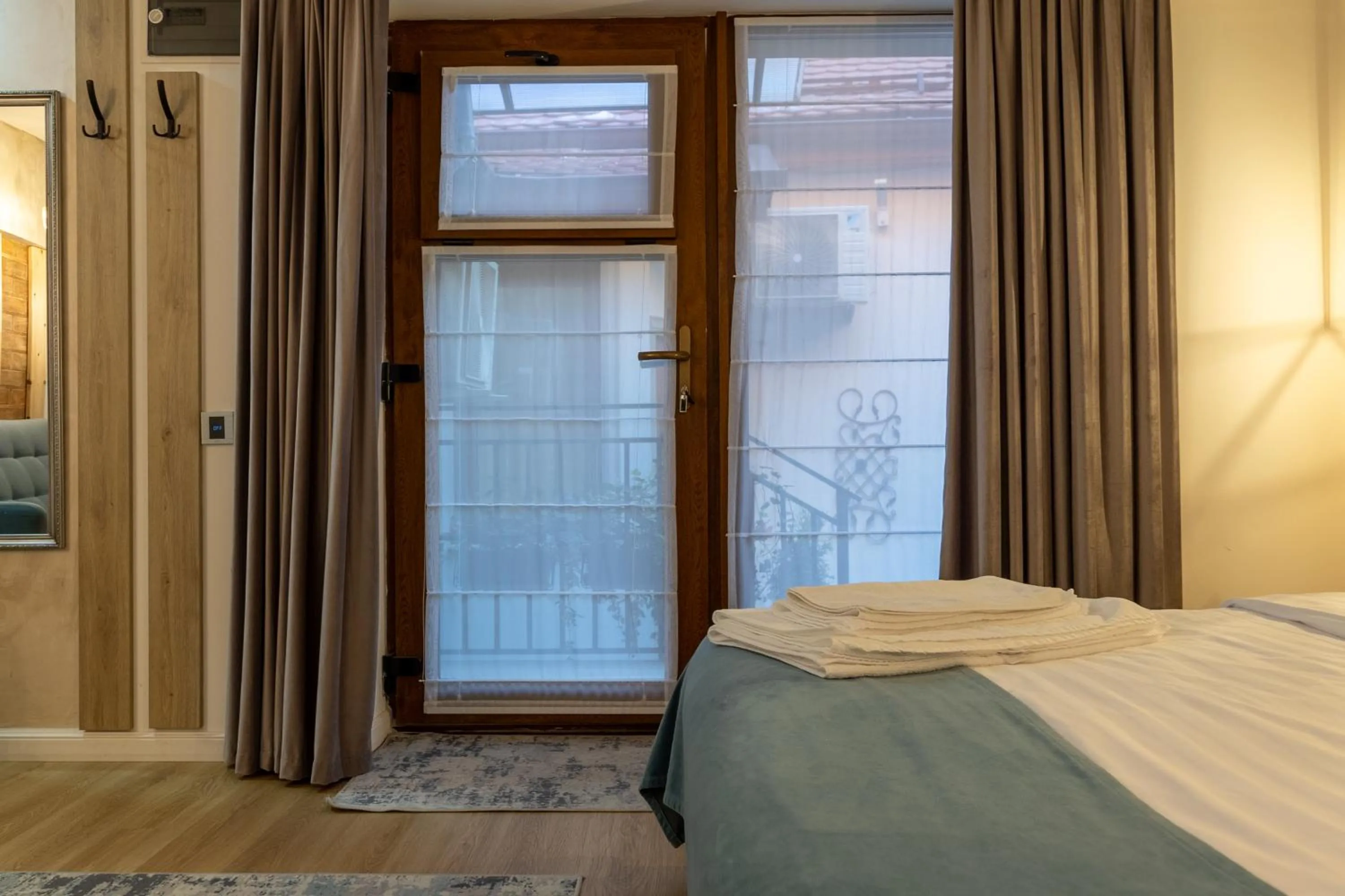 Photo of the whole room, Bed in Lumiere House Sibiu