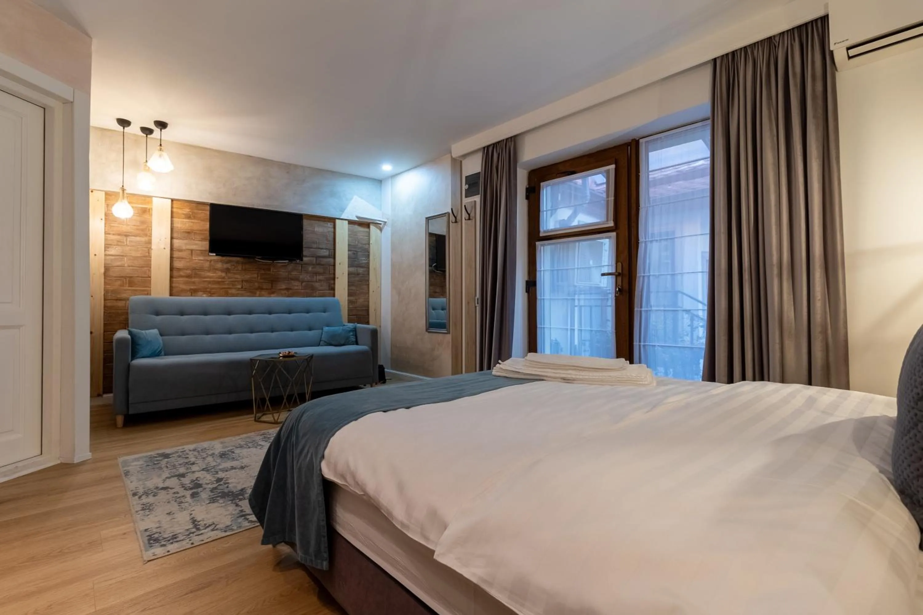 Photo of the whole room, Bed in Lumiere House Sibiu