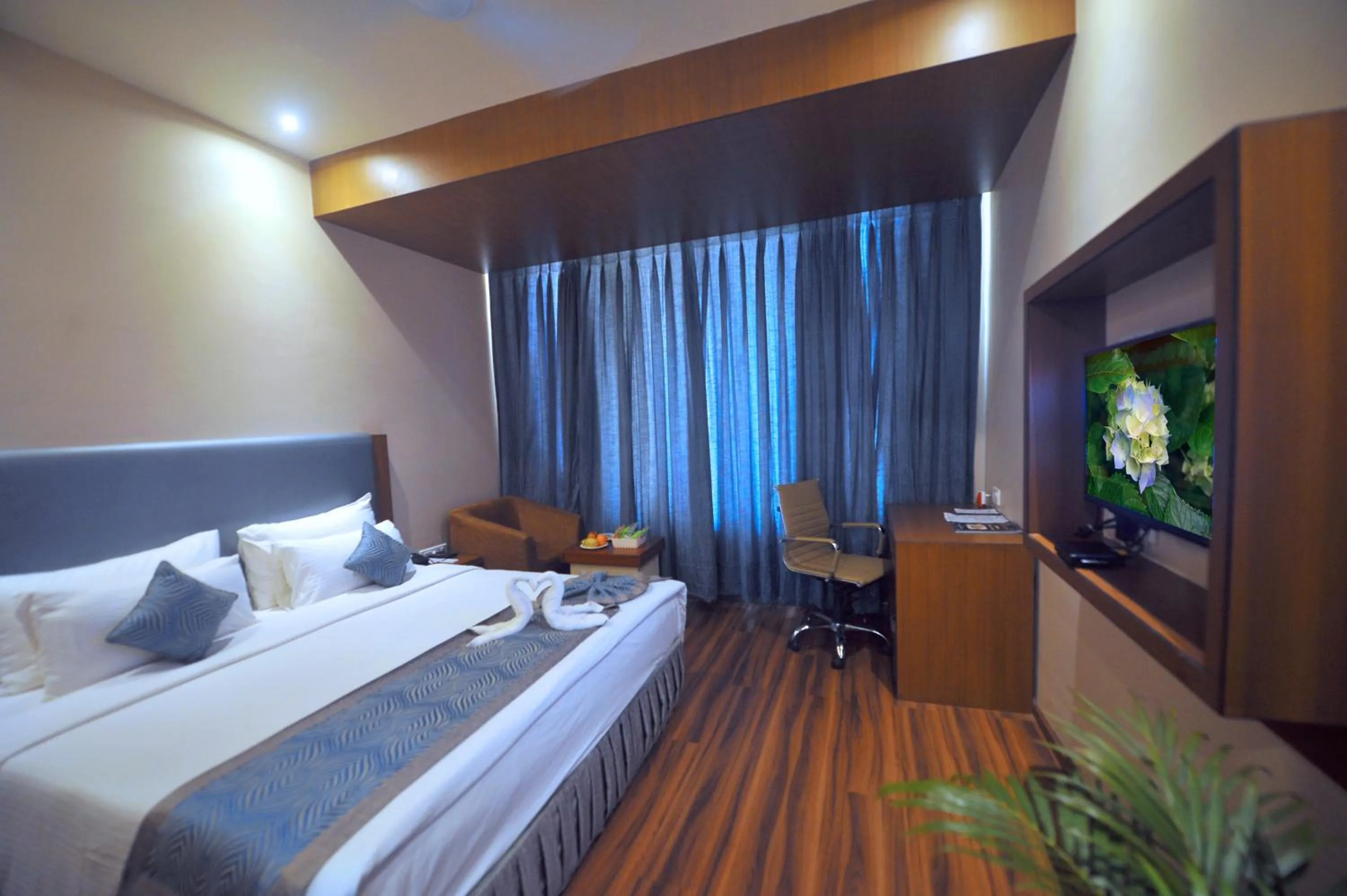 Bed in Pipul Padmaja Premium Hotel